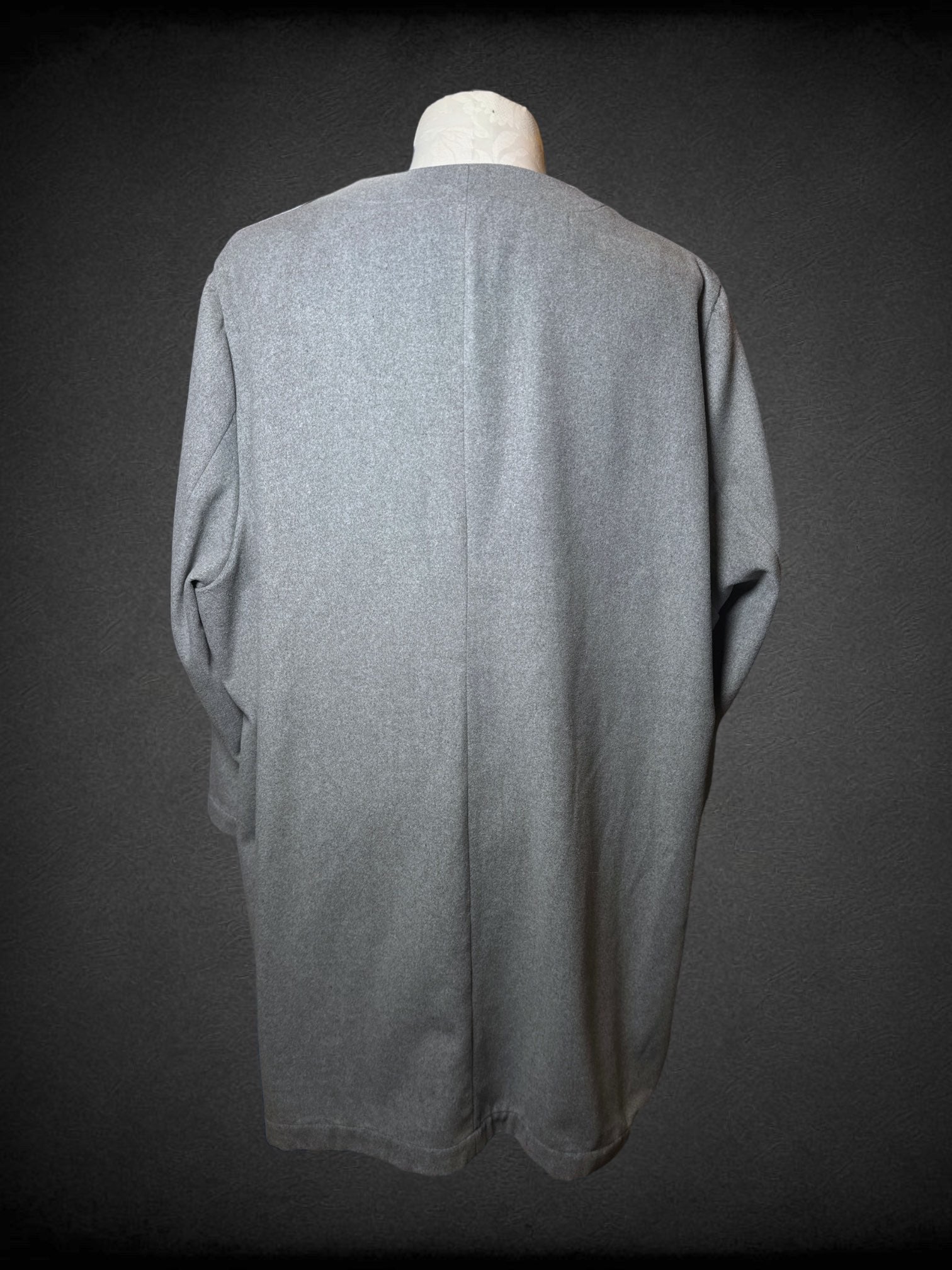 5X CAPSULE light grey v-neck jacket with button closure and pockets. Small stain near bottom front hem photographed