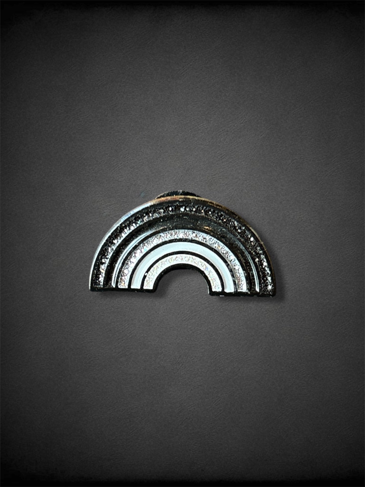 Monochromatic black to white sparkly rainbow pin