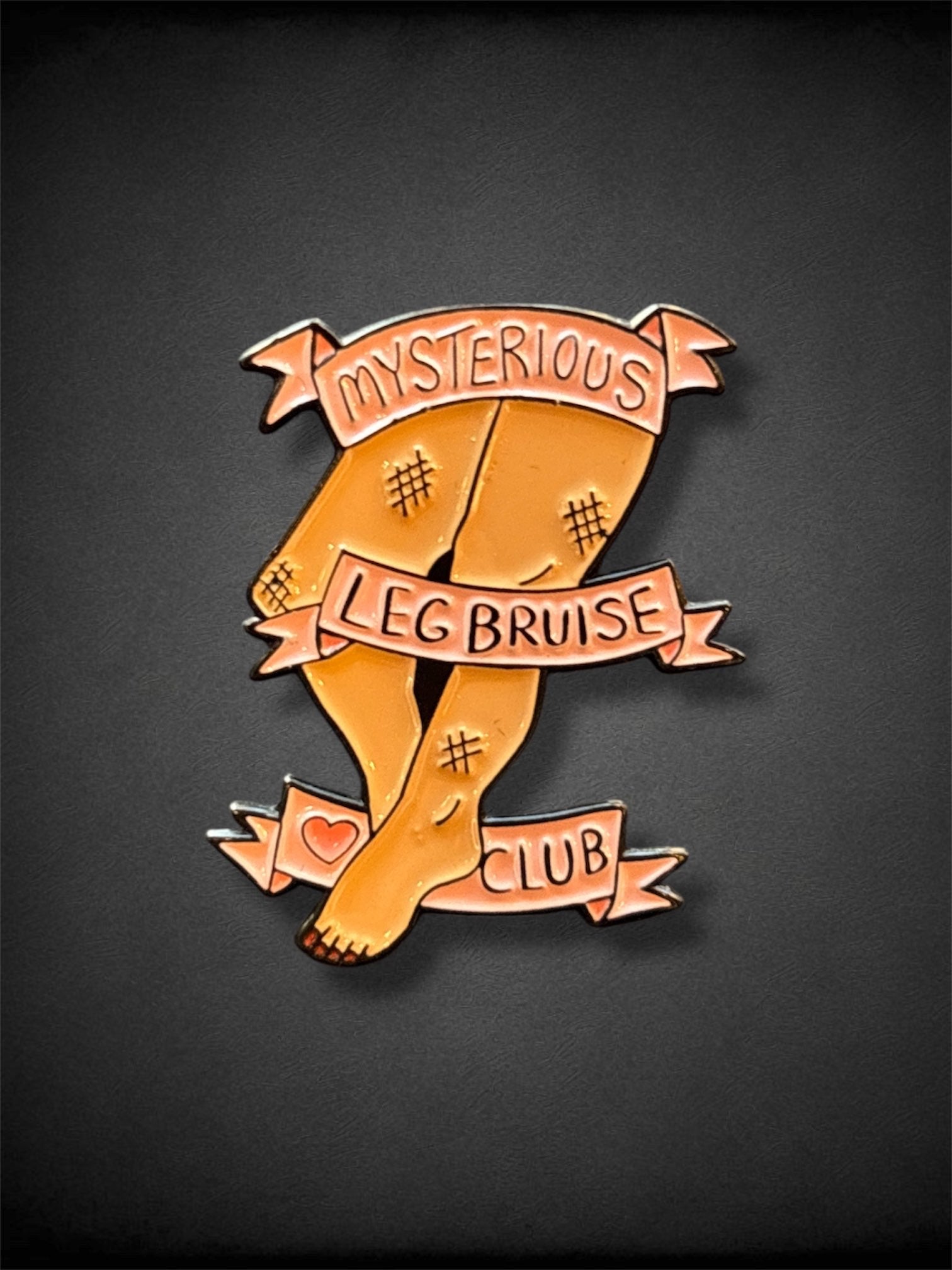 Mysterious leg bruise club pin