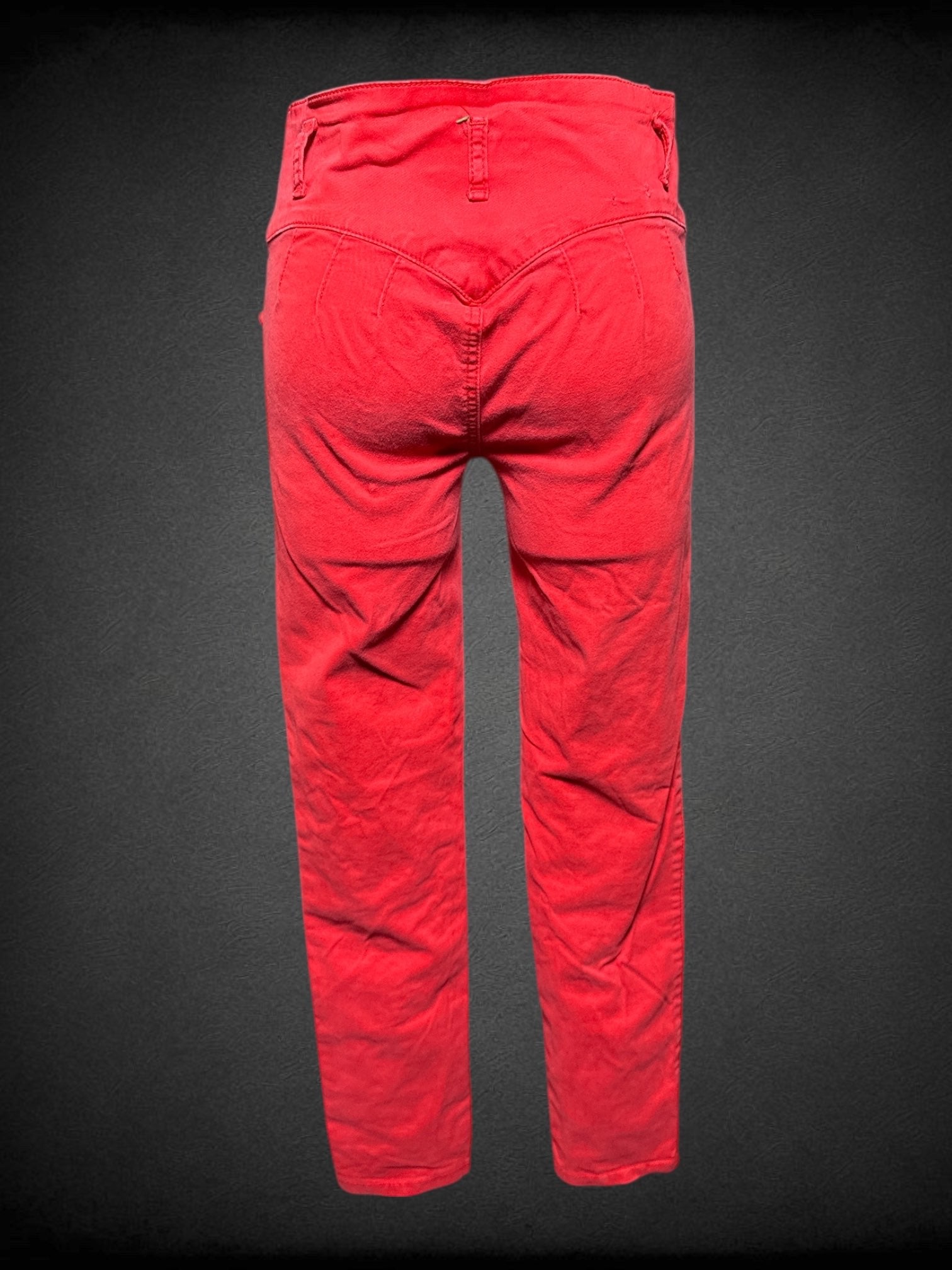 S Siluer Diva red pants with decorative pockets, bedazzled buttons and details, decorative ankles, and belt loops