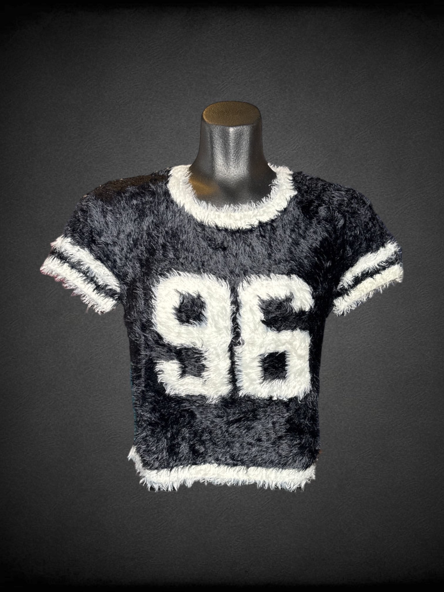 L Eric Lini black and white cropped short sleeve fluffy shirt styled as jersey with number 96 on front