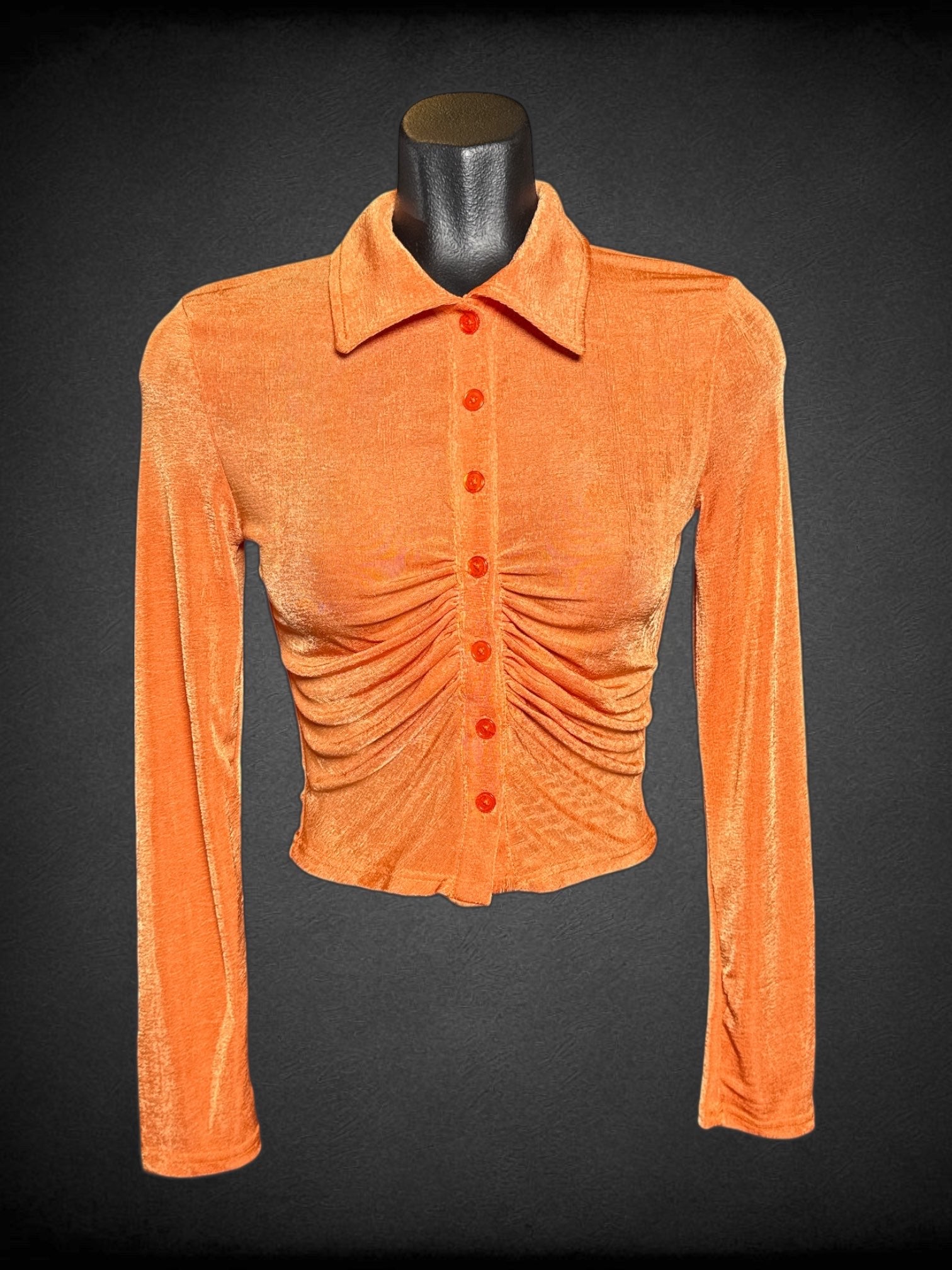 L Orange button up crop top  with underbust pleating, and long sleeves