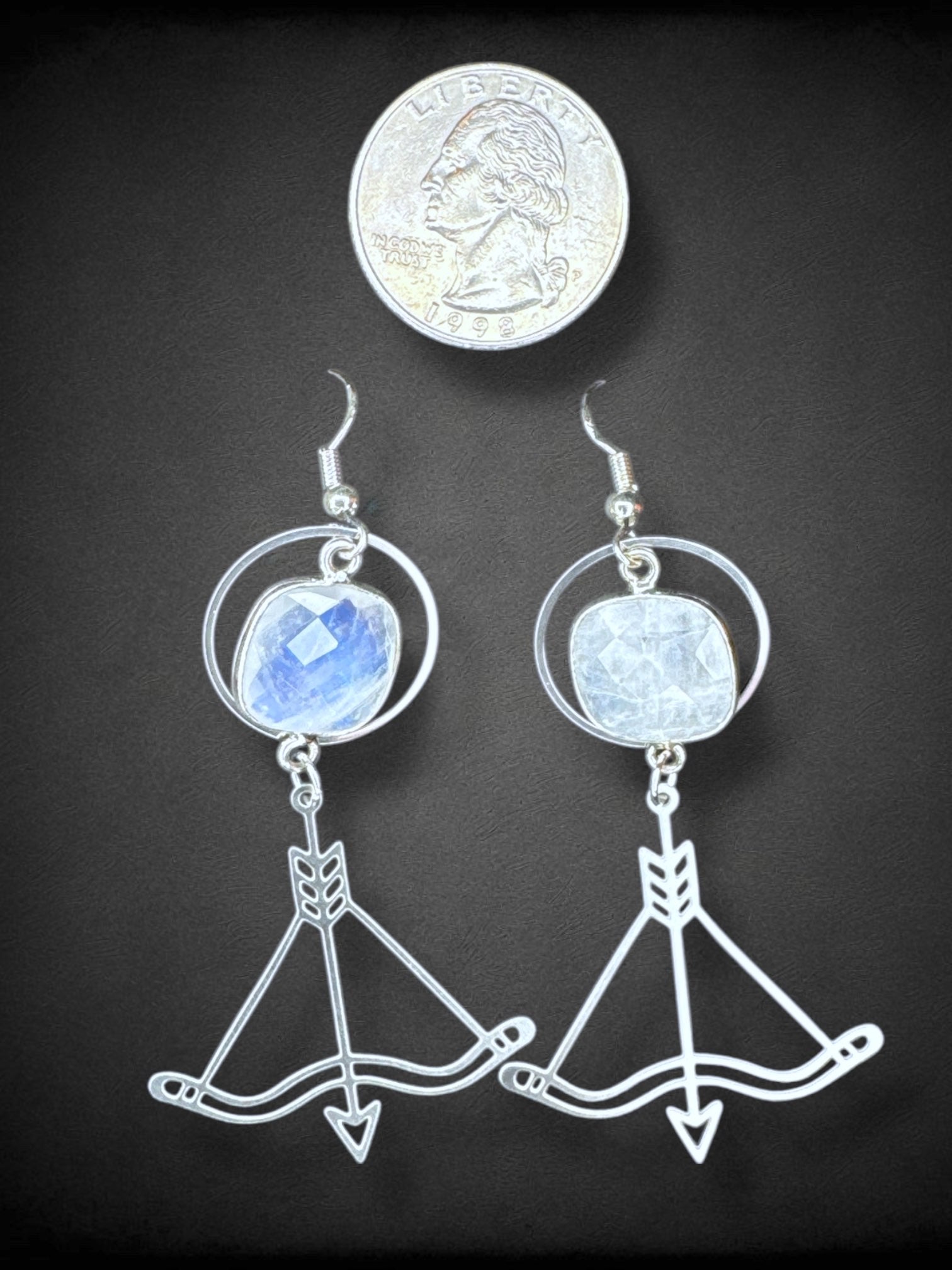 Silver tone bow and arrow earrings with big rhinestones