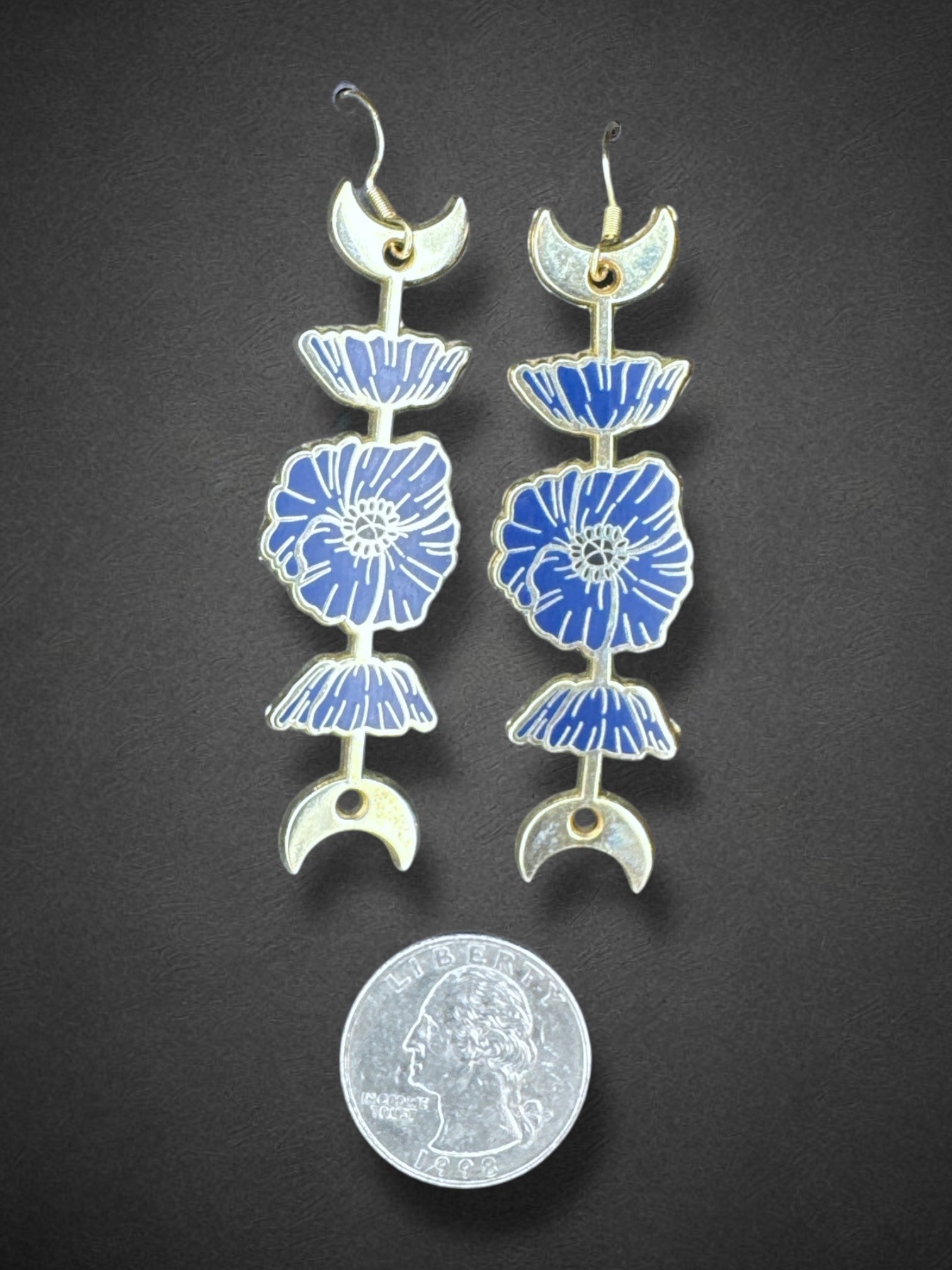 Gold tone moon earrings with blue florals