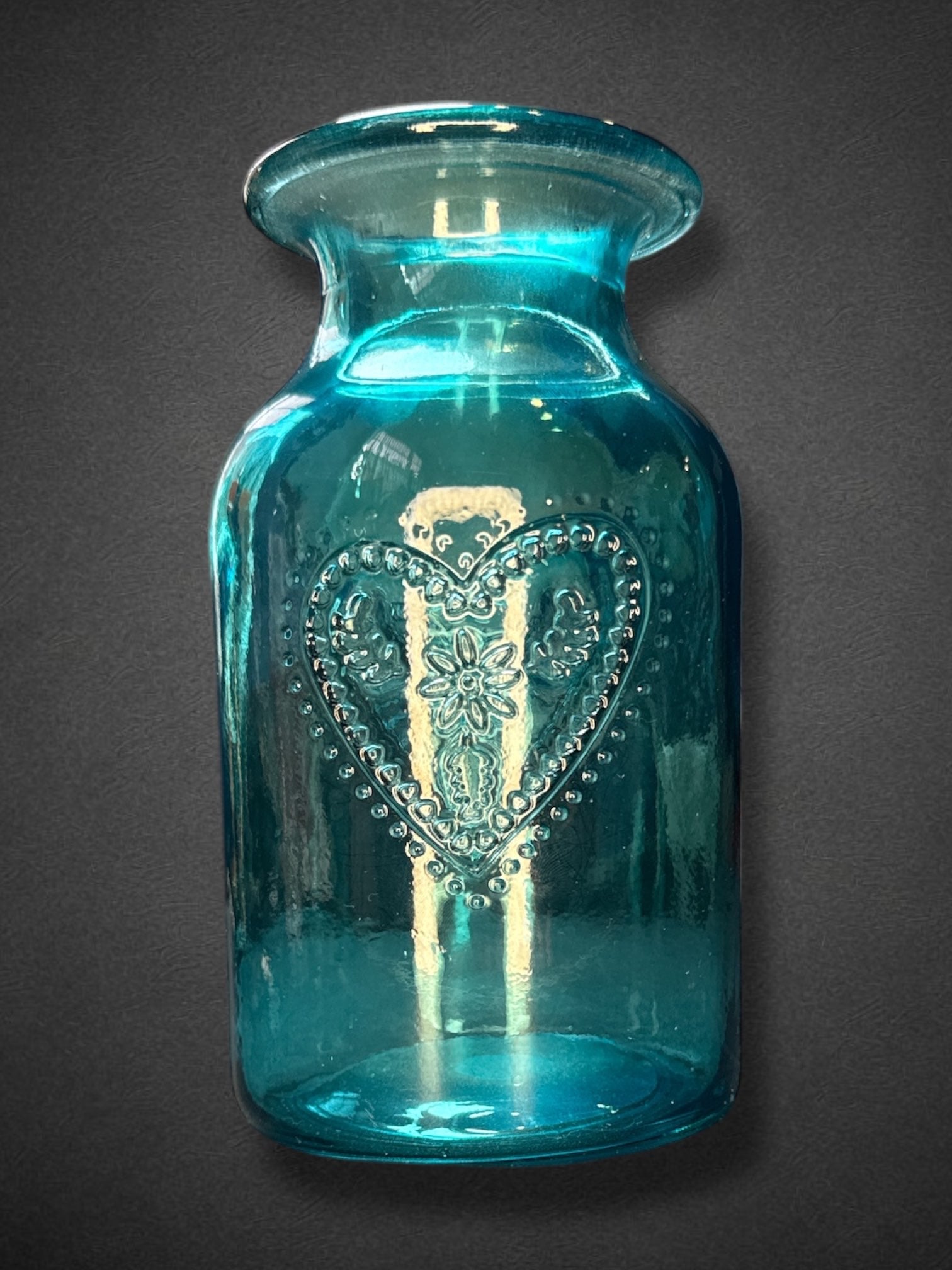 6” by 3” blue glass jar with hearts