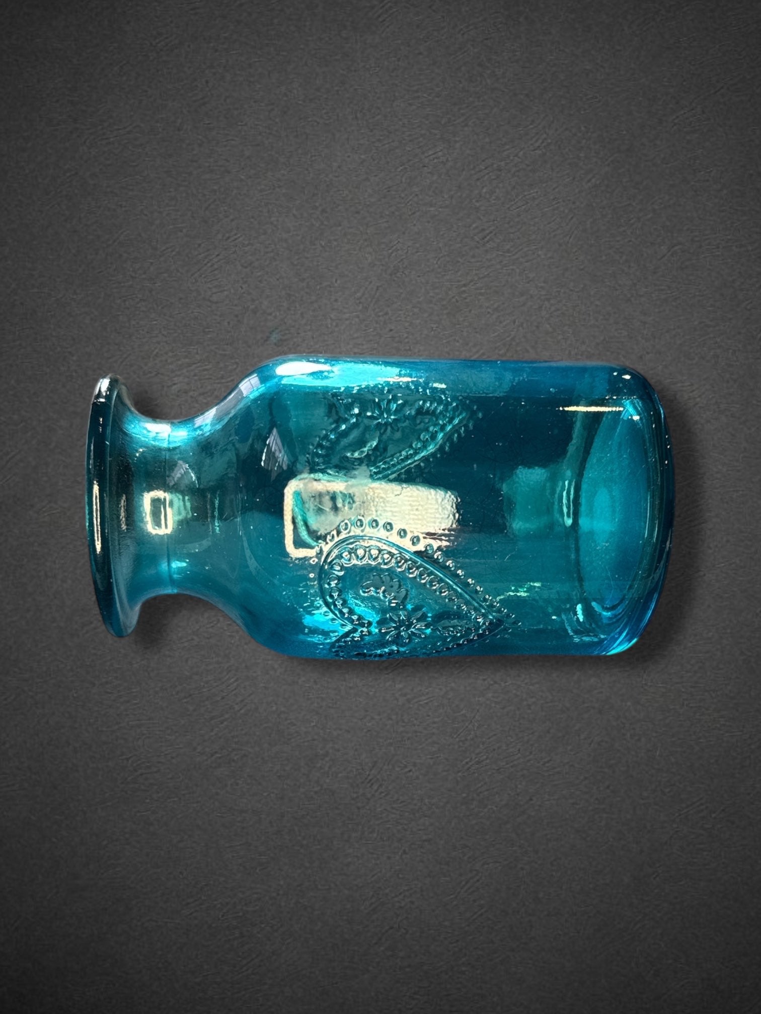 6” by 3” blue glass jar with hearts