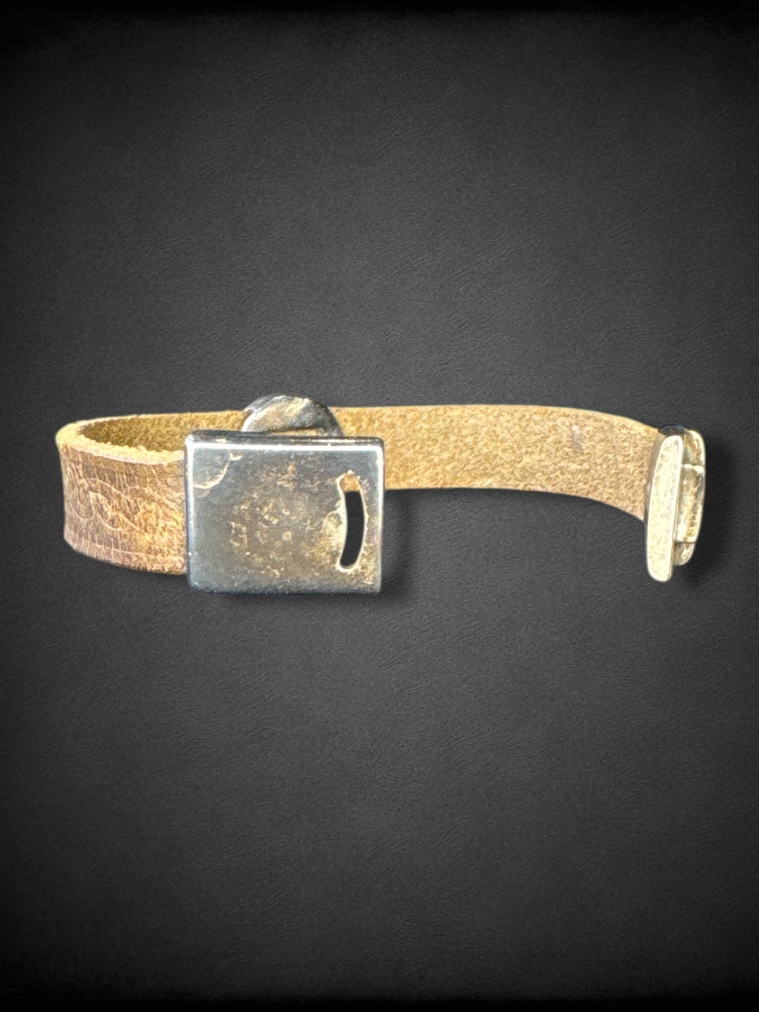 Leather bracelet with Celtic knot embossing and swirl metal pendant handmade in Ireland by Lee River