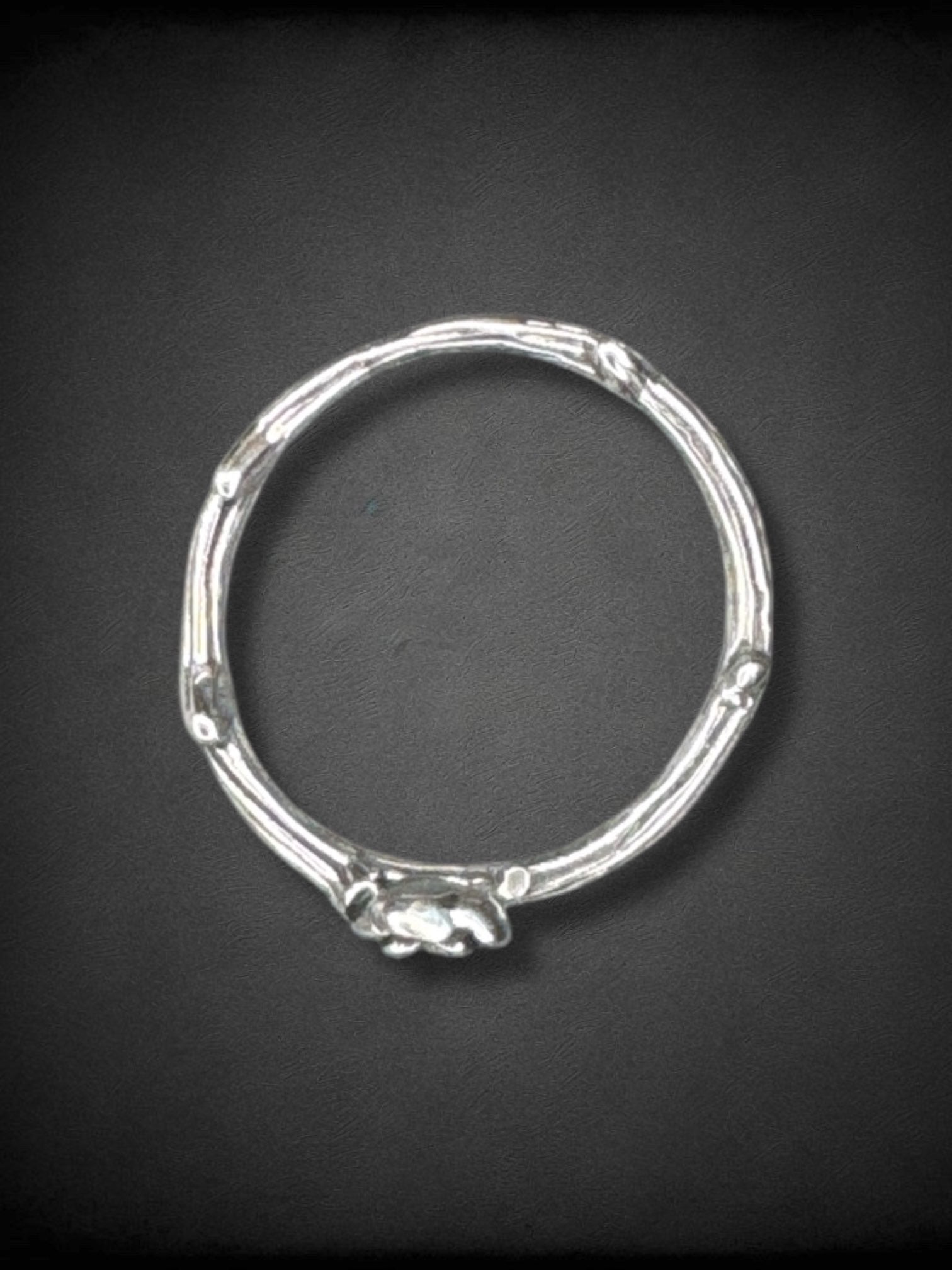 Adjustable silver tone thorn and rose ring