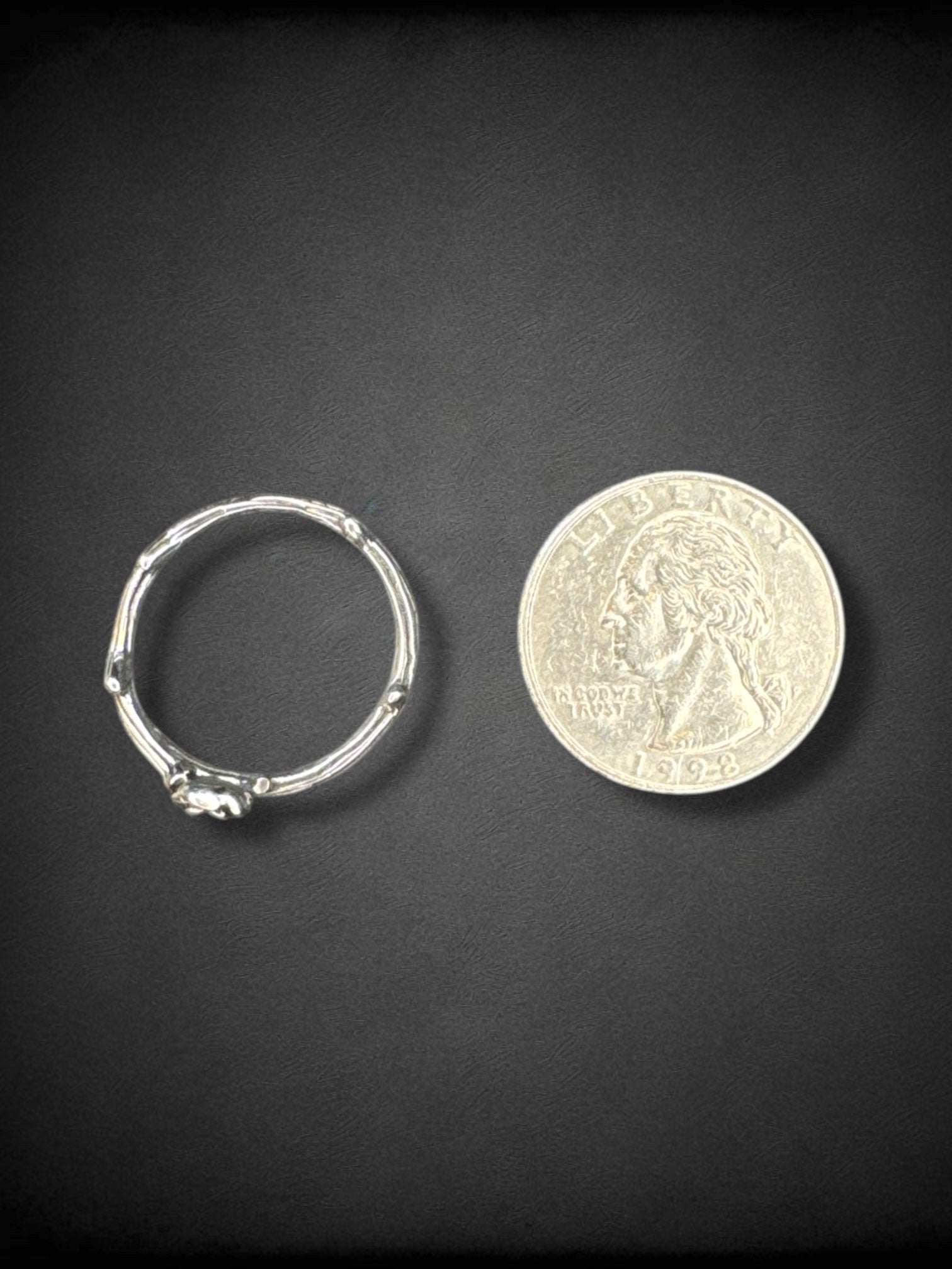 Adjustable silver tone thorn and rose ring