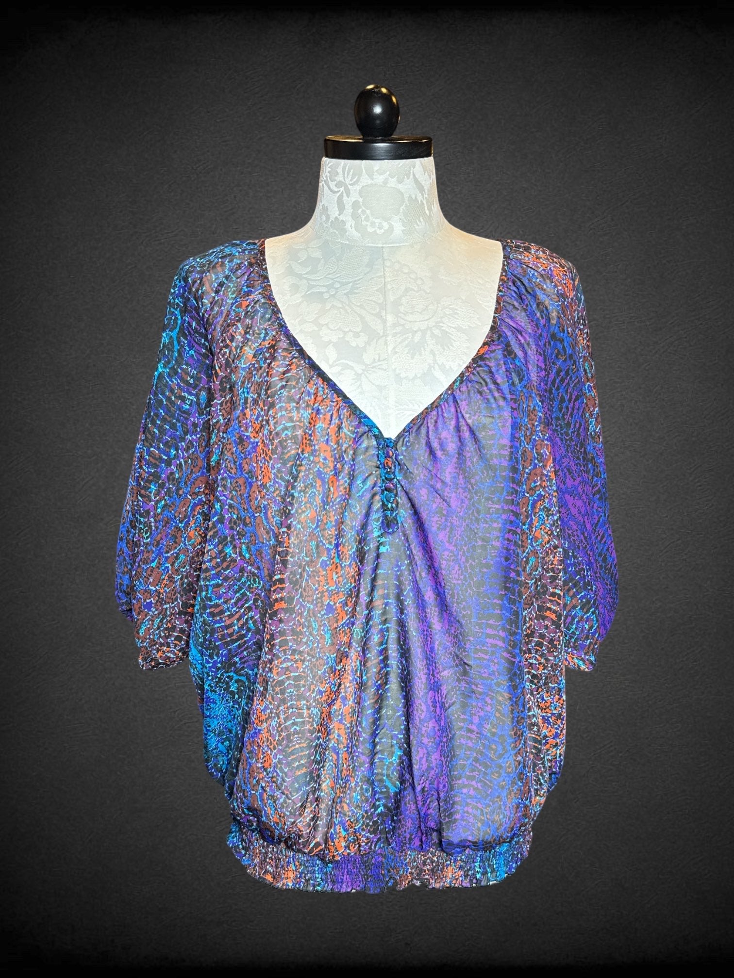 4X Pure Energy multicolor sheer top with balloon sleeves, elastic waist, and anima print design