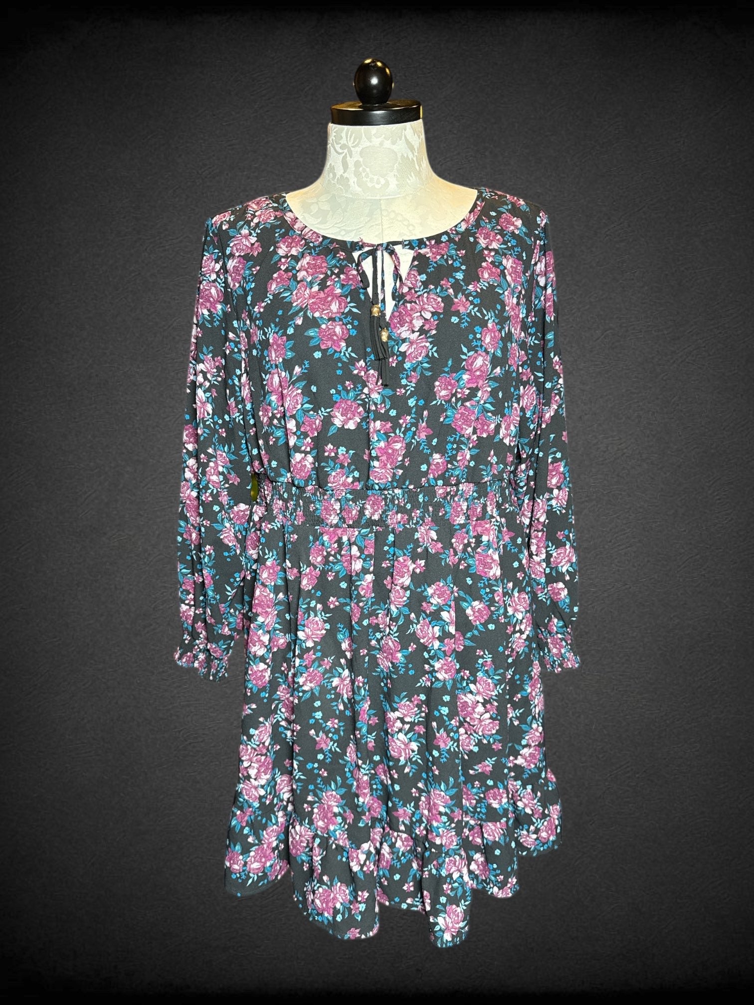 4X Torrid black long sleeve dress with shirred balloon sleeves, tie on front, and florals