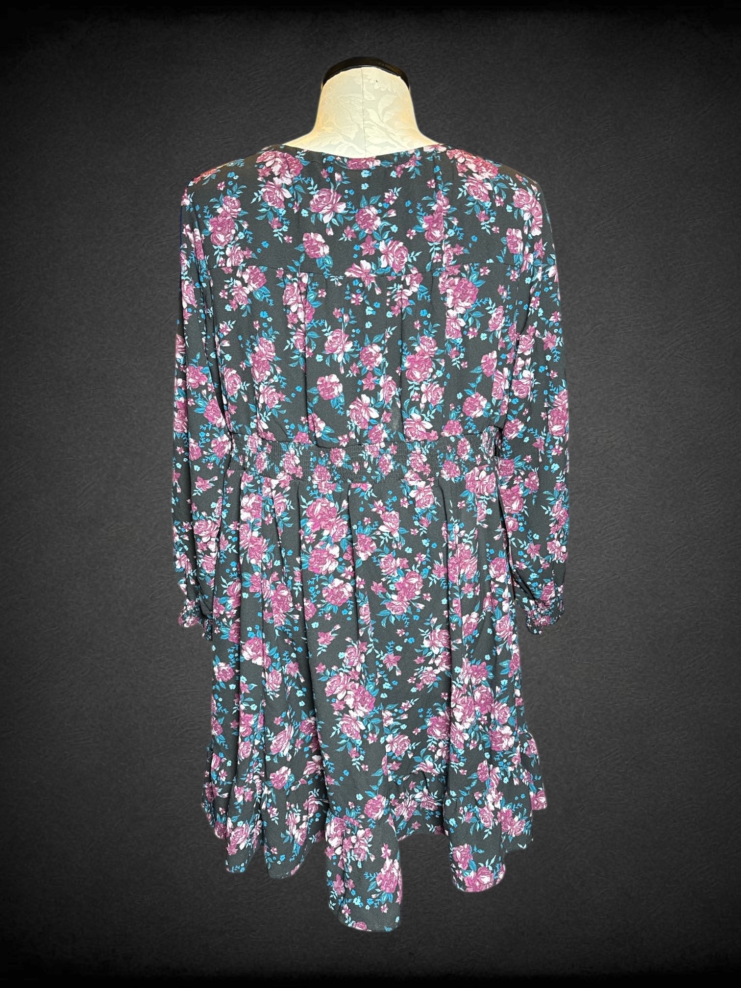 4X Torrid black long sleeve dress with shirred balloon sleeves, tie on front, and florals