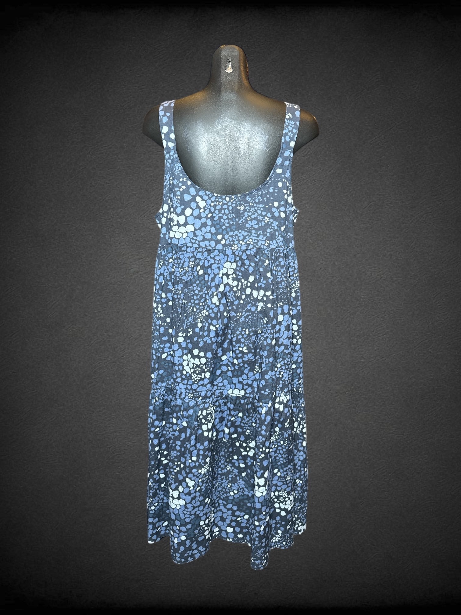 L NWT Adore Me navy blue sleeveless dress with lighter shades of blue irregular polka dots, buttons on top, and pockets