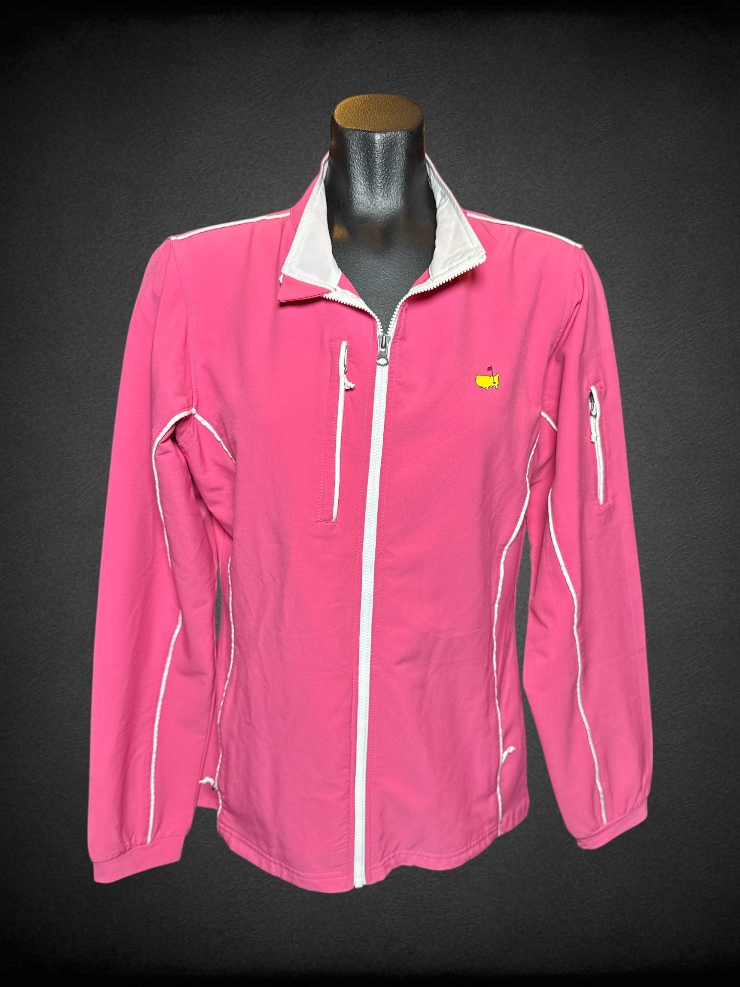 L Magnolia Lane pink long sleeve zip up jacket with white accents, zipper pockets, and US small graphic on chest