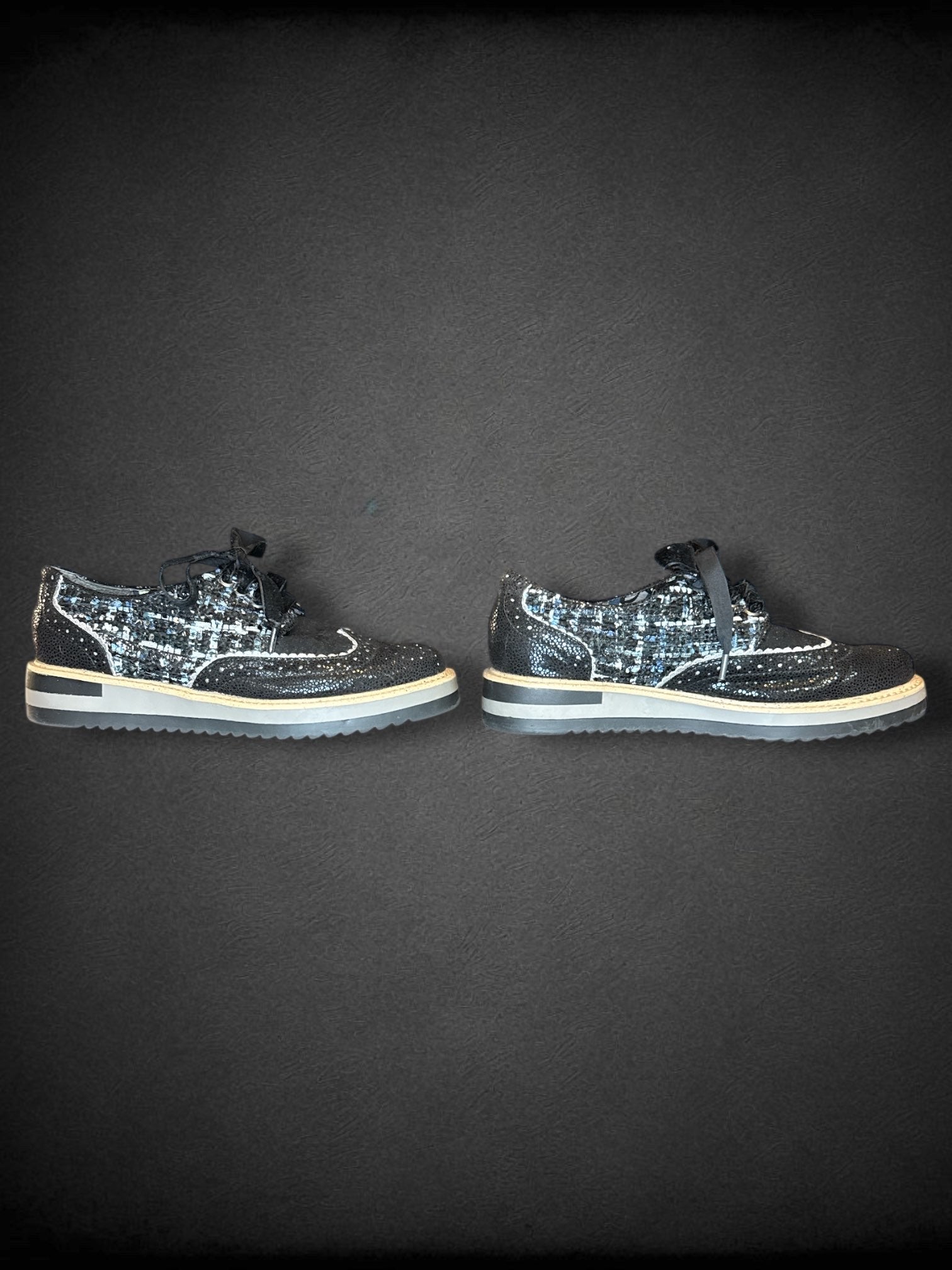 Size 6 women’s Ruby Shoo black textured sneakers with velvet laces