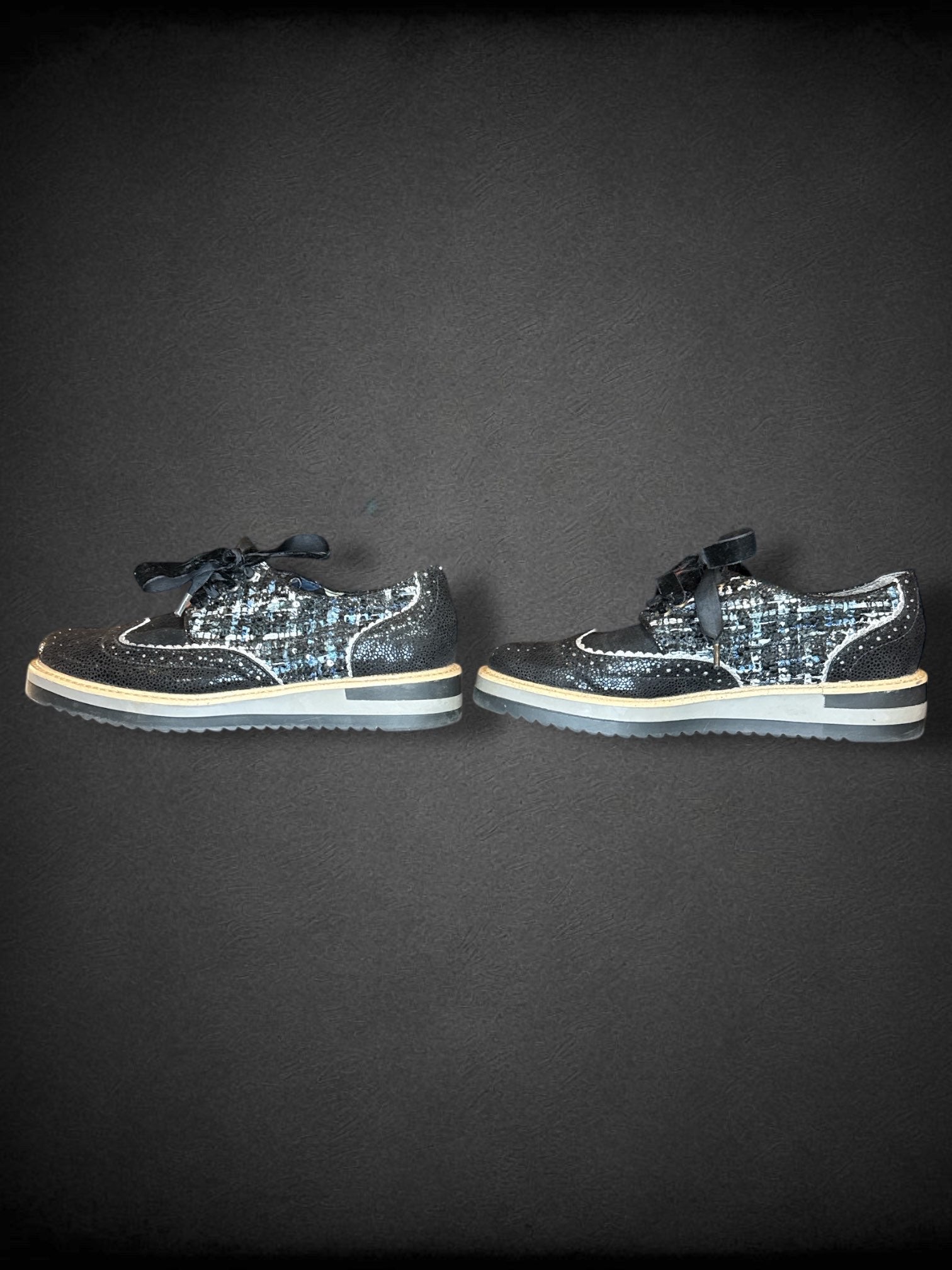 Size 6 women’s Ruby Shoo black textured sneakers with velvet laces