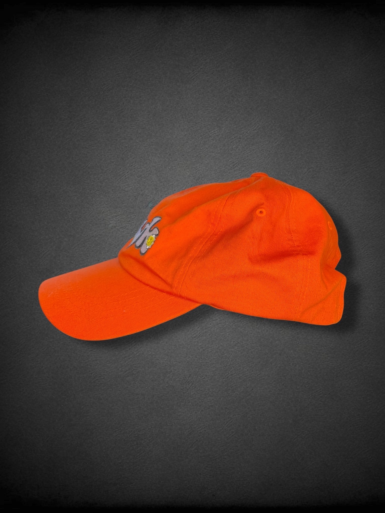 Orange “iykyk” groovy text embroidered baseball cap with flowers