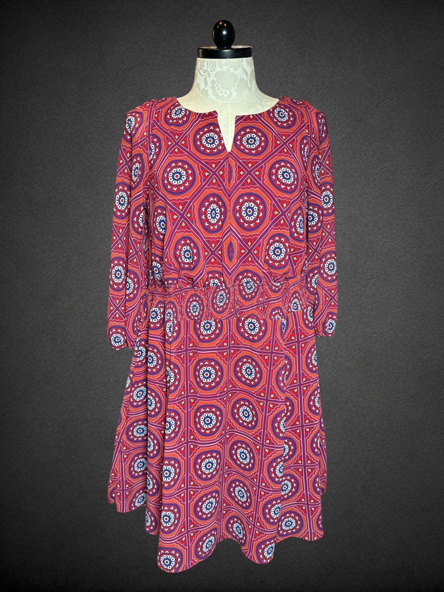 1X Wayward Fancies maroon long sleeve dress with geometric design, shirted waist, pockets, and zipper on back