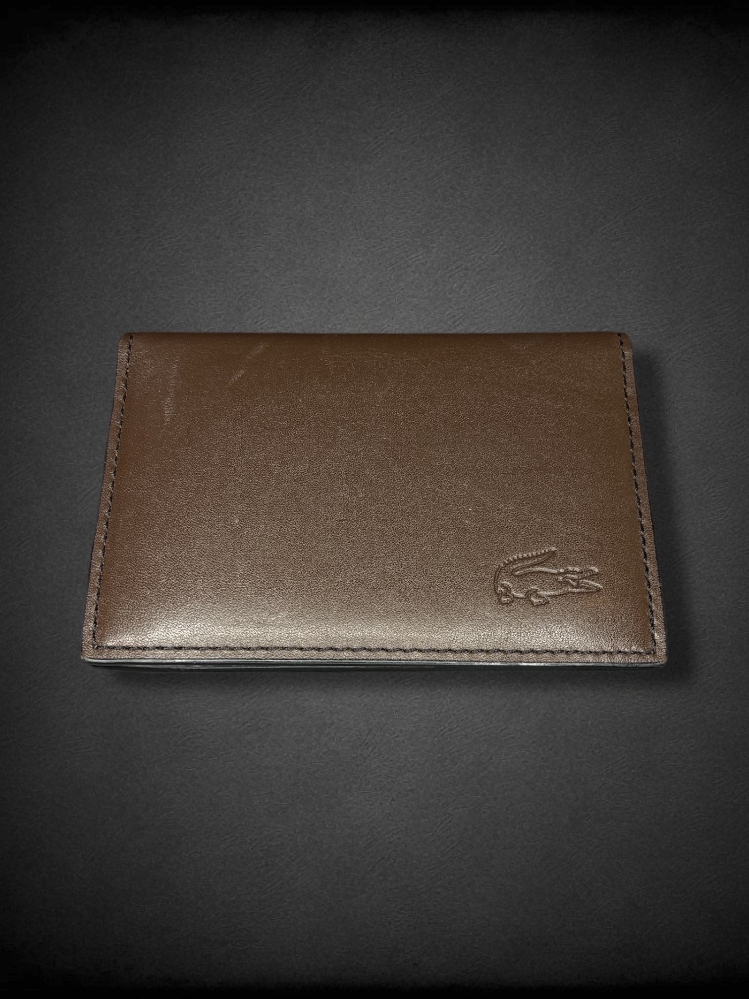LACOSTE brown leather bi-fold card wallet with minor marks