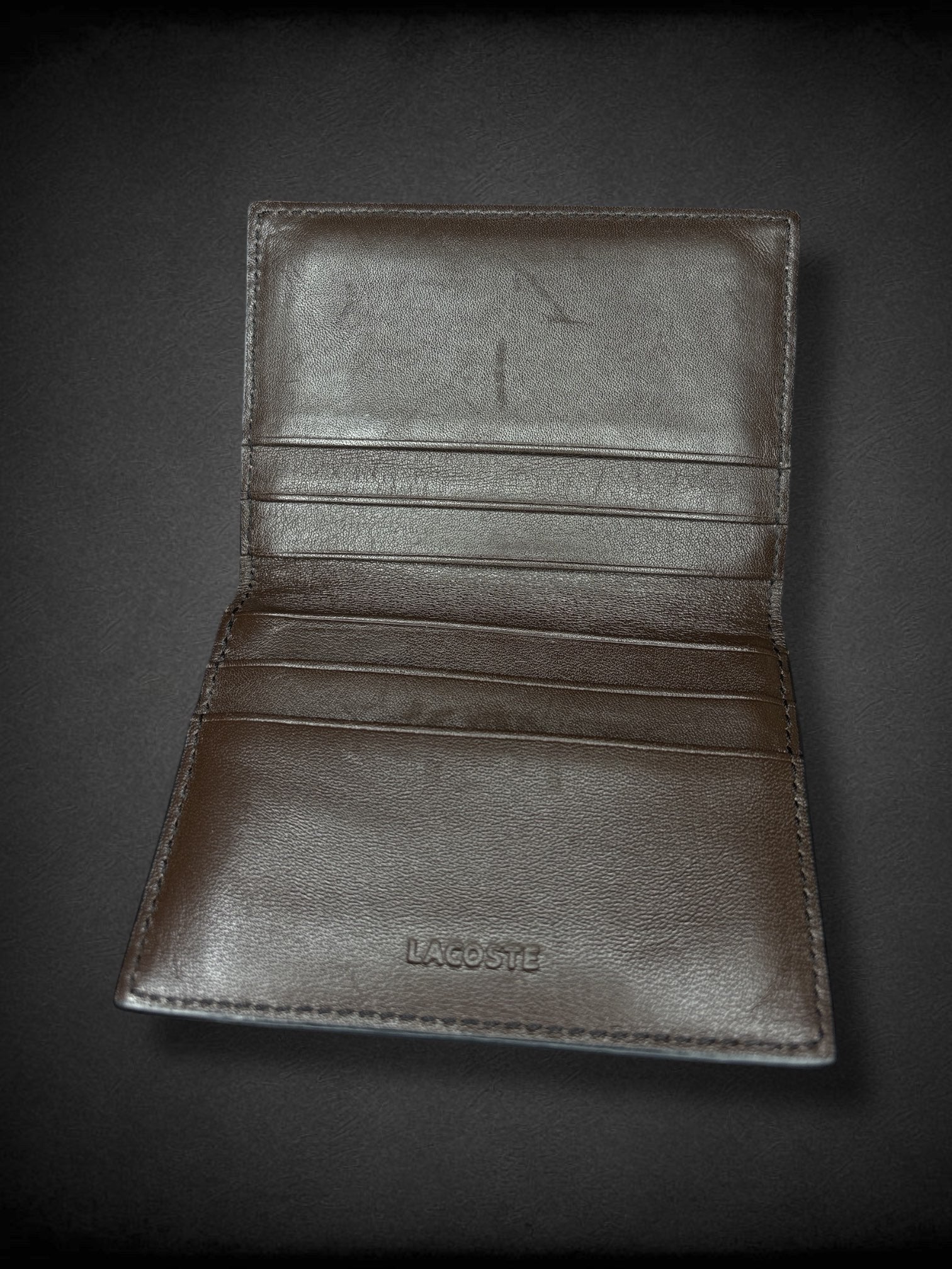 LACOSTE brown leather bi-fold card wallet with minor marks