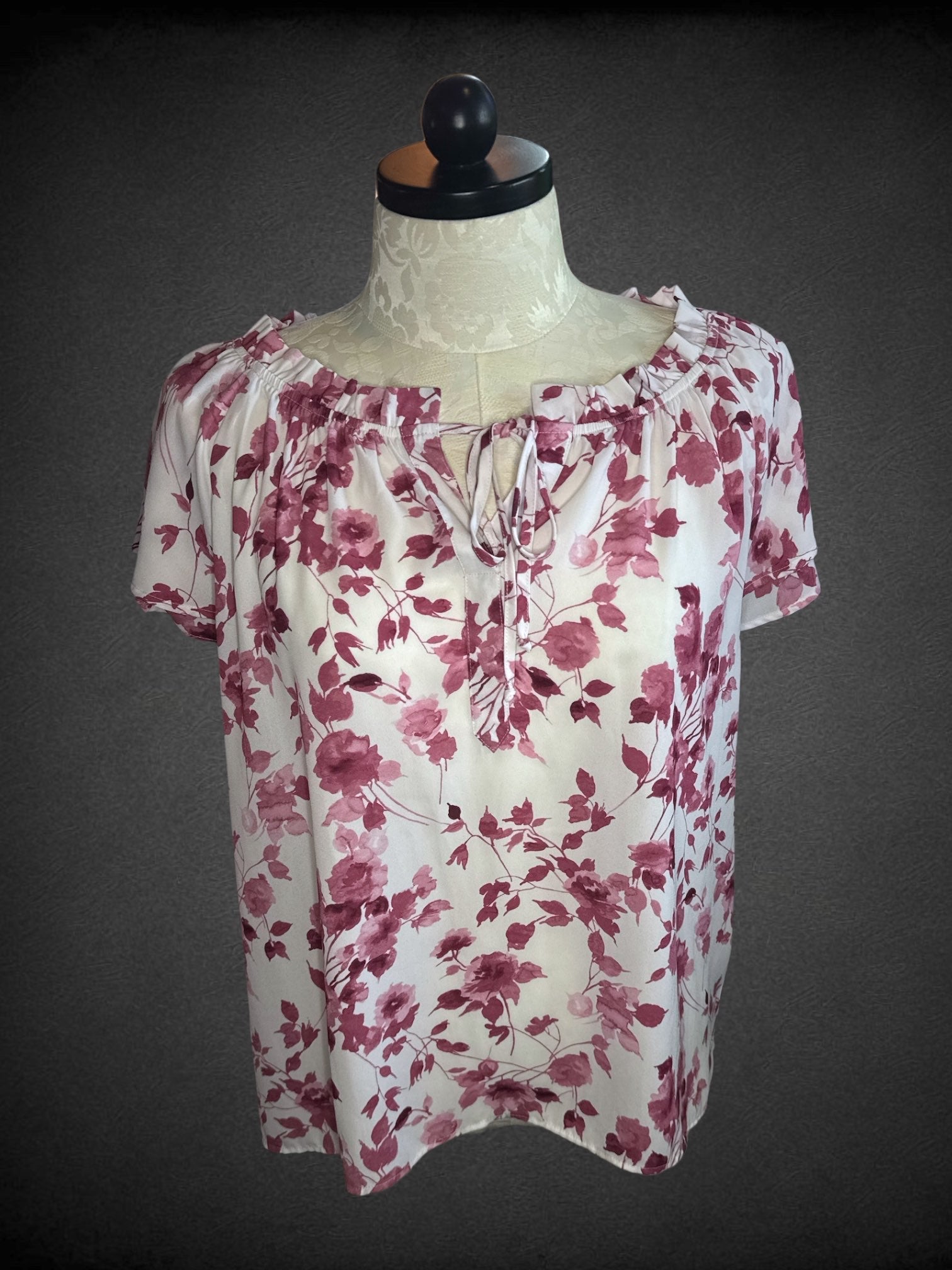 2X COUNTERPARTS white top with magenta floral patter, elastic neckline, drawstring tie, and flowy short sleeves