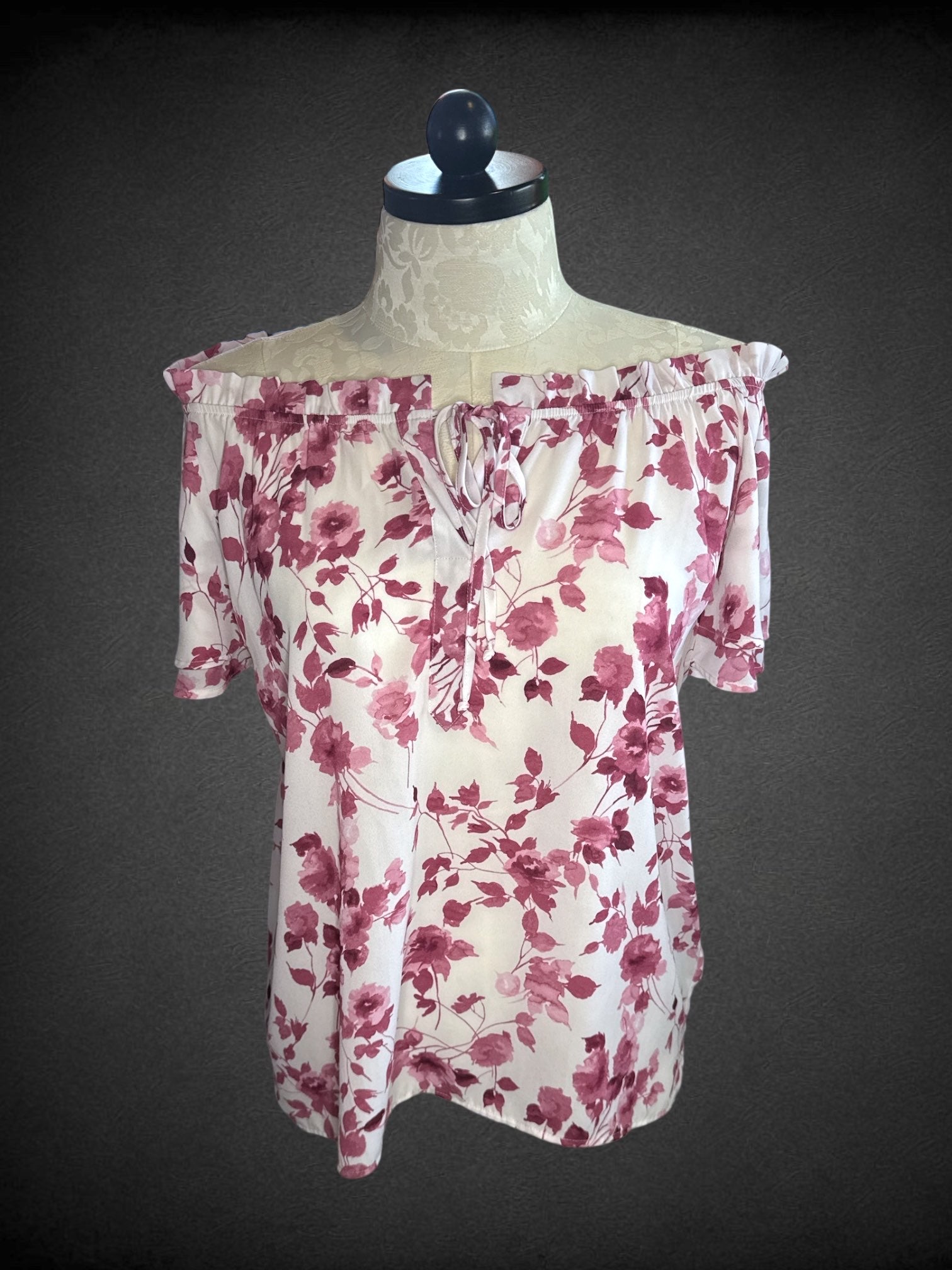 2X COUNTERPARTS white top with magenta floral patter, elastic neckline, drawstring tie, and flowy short sleeves