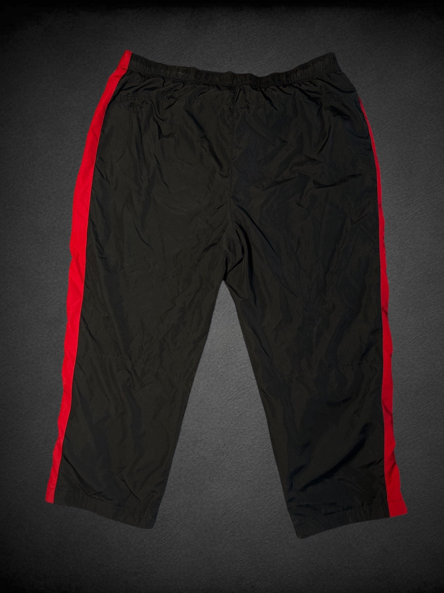 2X STARTER black track pants with red side pinstripes and elastic drawstring waistband