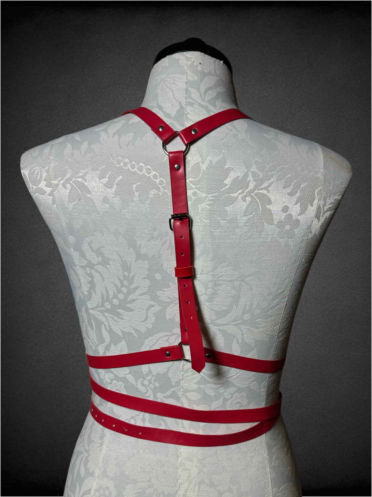 Red strap chest harness