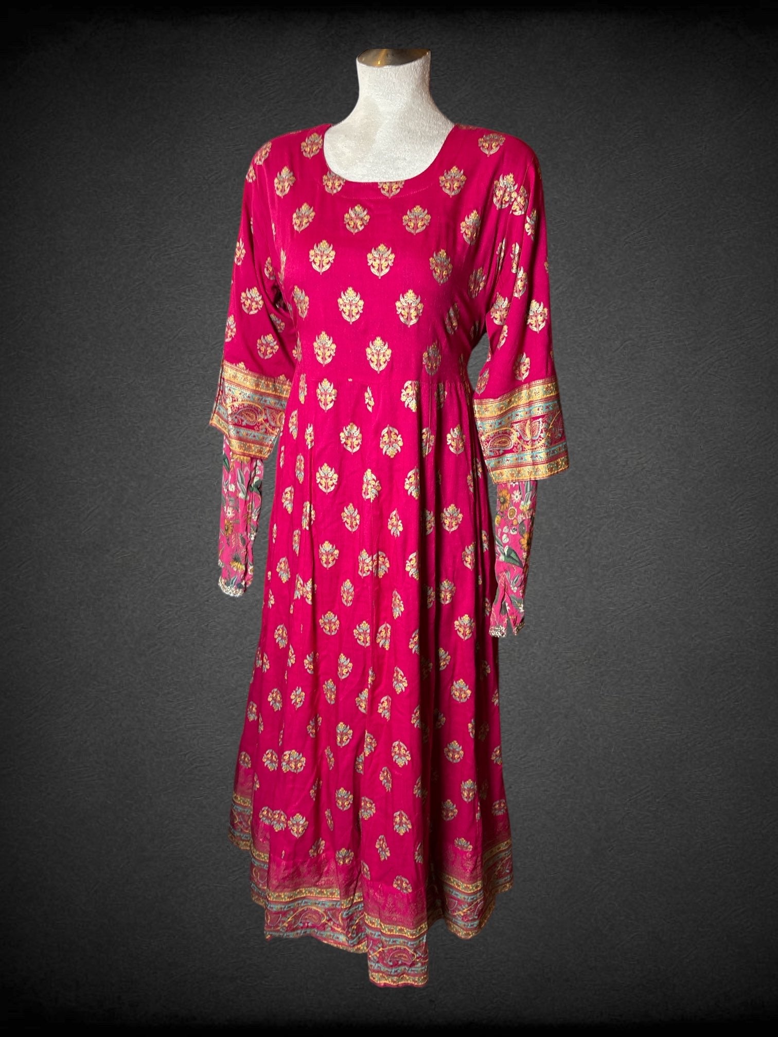 XL Janasya 4-piece set Forest green chiffon scarf with champagne metallic appliqué hems, pink floral dress with champagne metallic appliqué hems and matching drawstring flowy pants, fuschia dress with floral pattern and tie back with tassels
