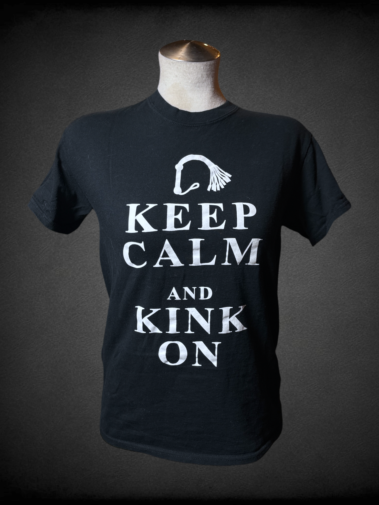 M black t-shirt with flogger graphic and text “KEEP CALM AND KINK ON”