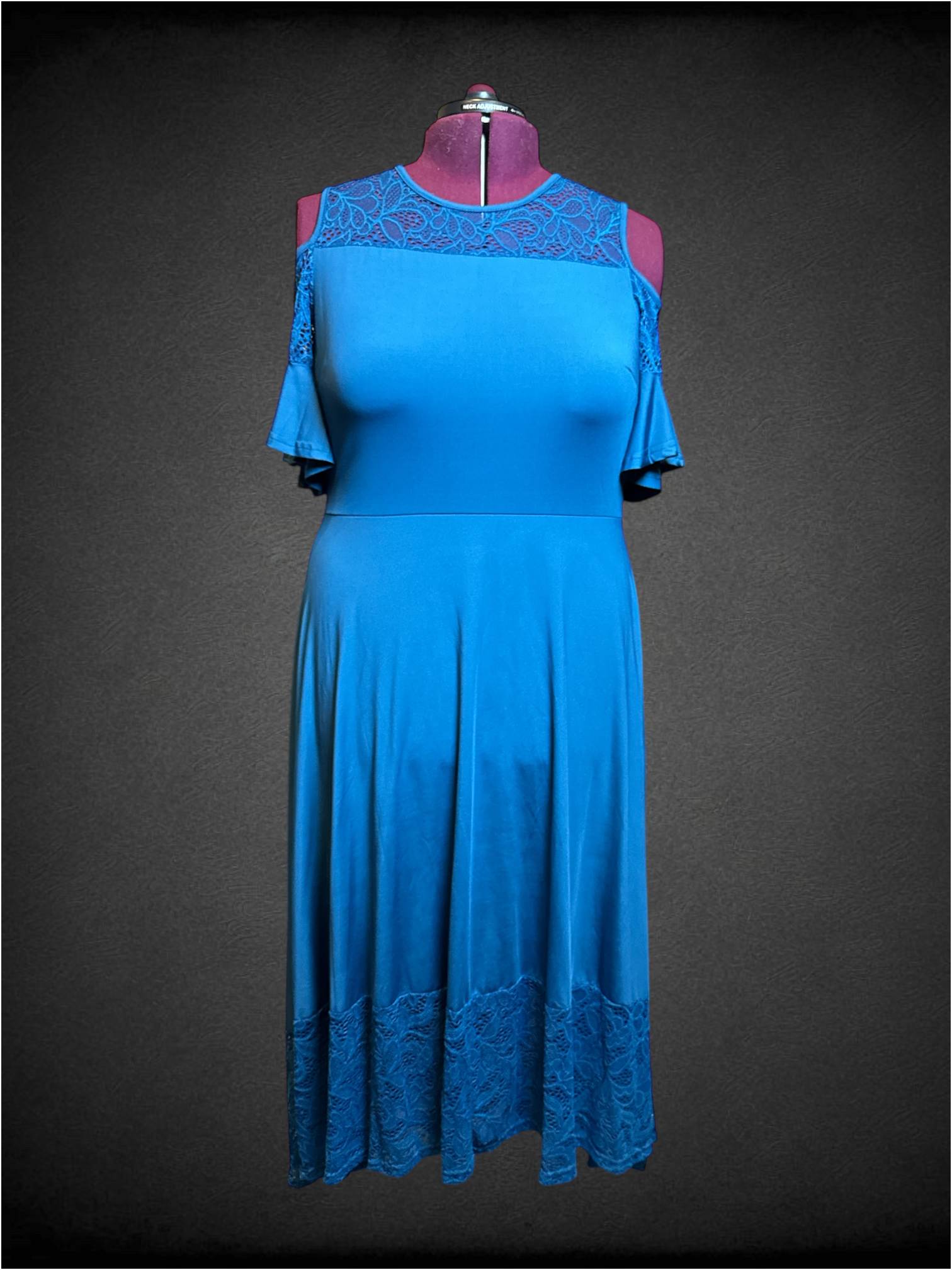 3X blue high low dress with cold shoulders, lace chest, and lace hem
