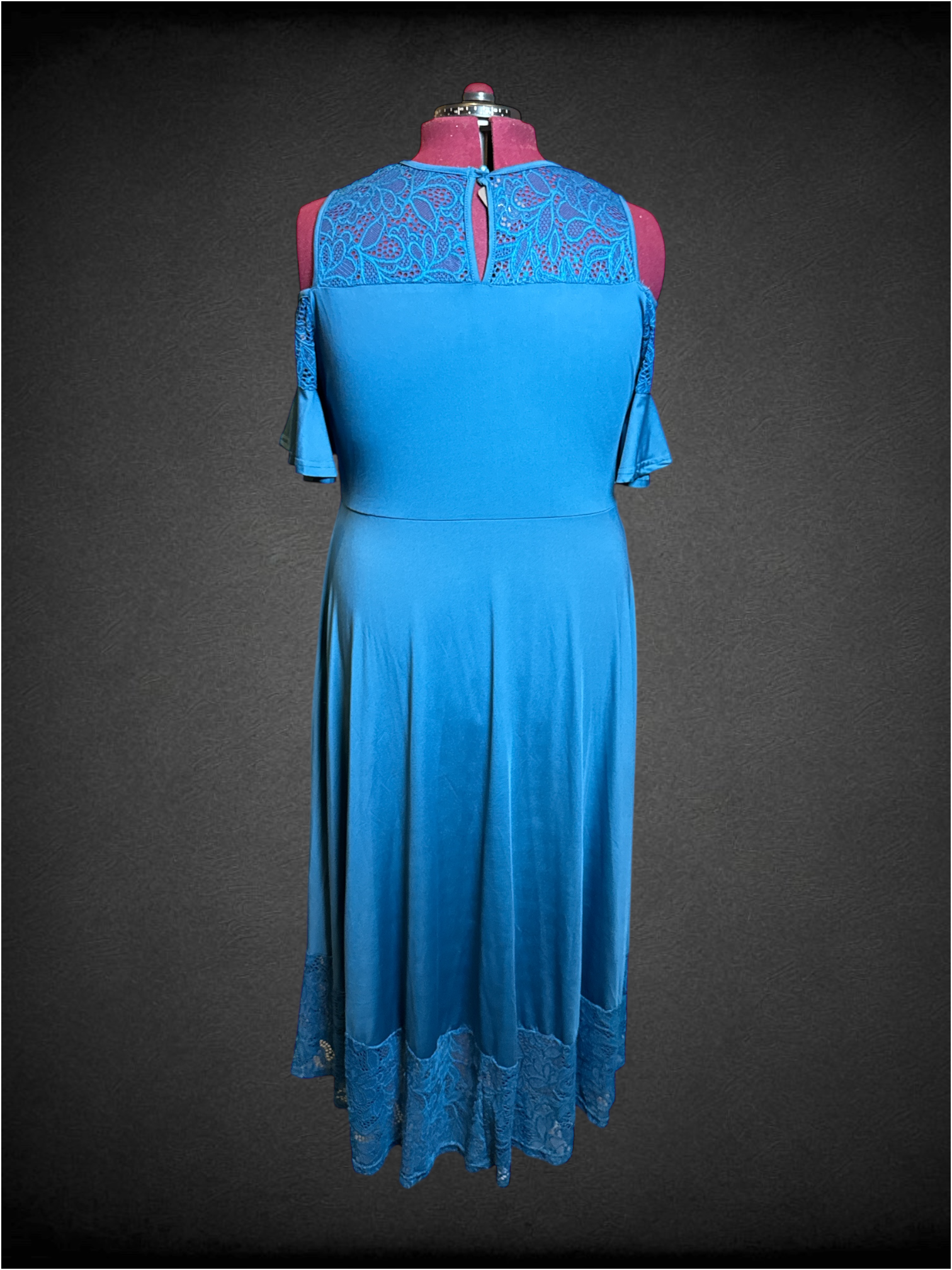 3X blue high low dress with cold shoulders, lace chest, and lace hem