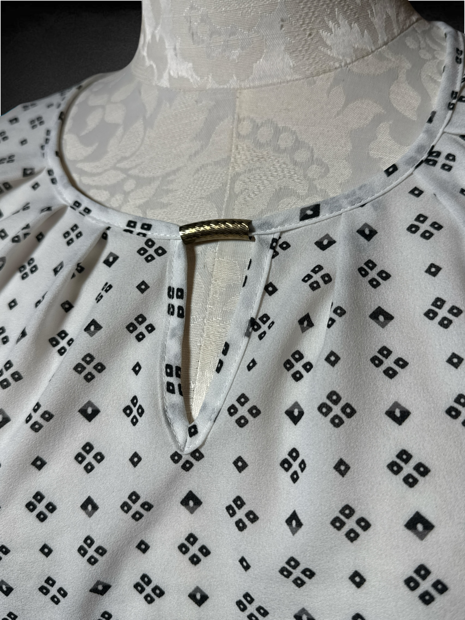 2X Jon & Anna white blouse with geometric design and metal accent