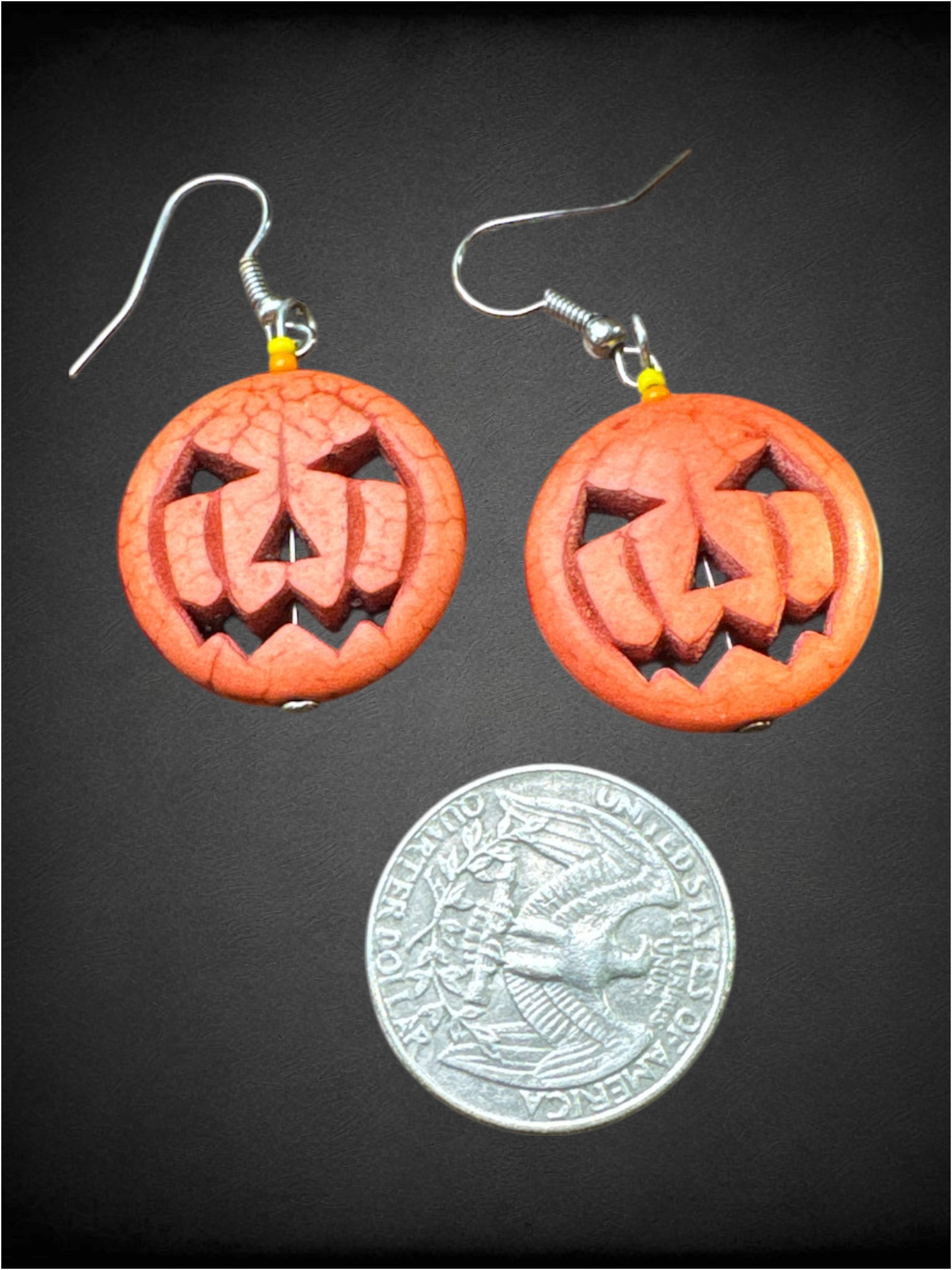 Orange carved stone jack o lantern earrings