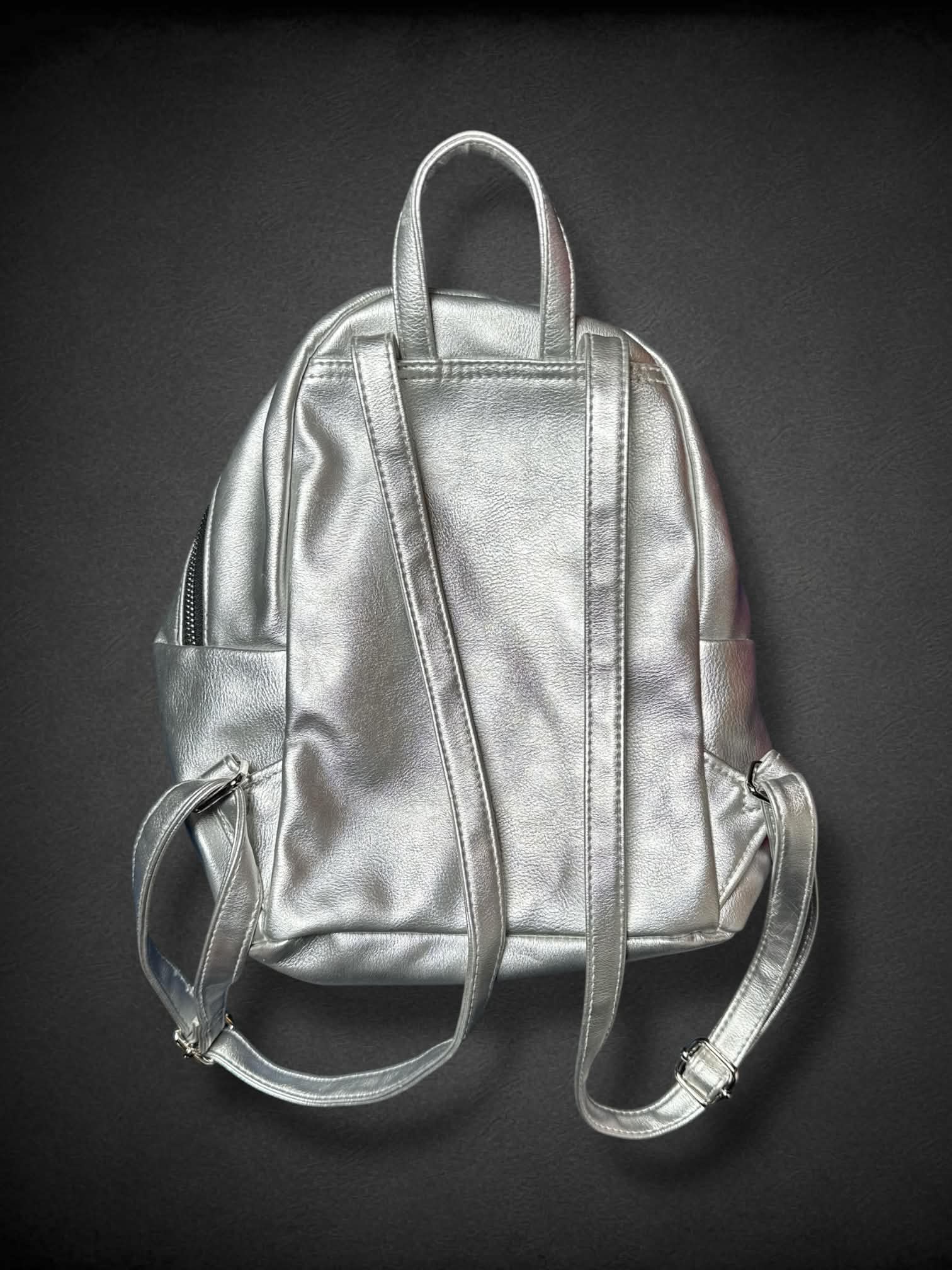 American Eagle Silver Mini Backpack with black and white polka dot interior