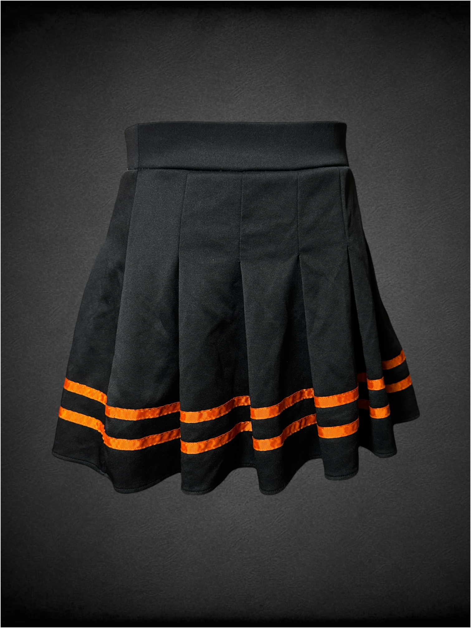 L black pleated skirt with orange ribbon stripes