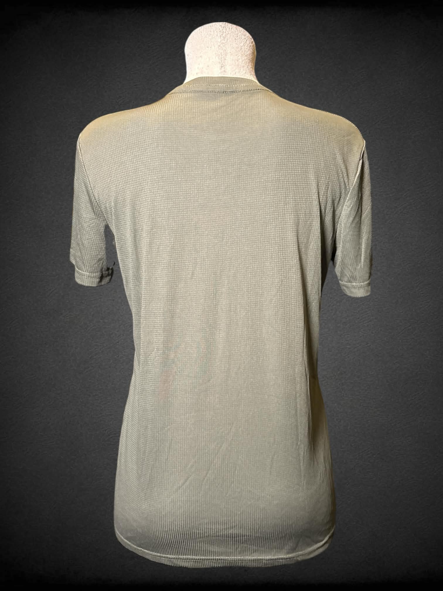L Green athletic material t shirt