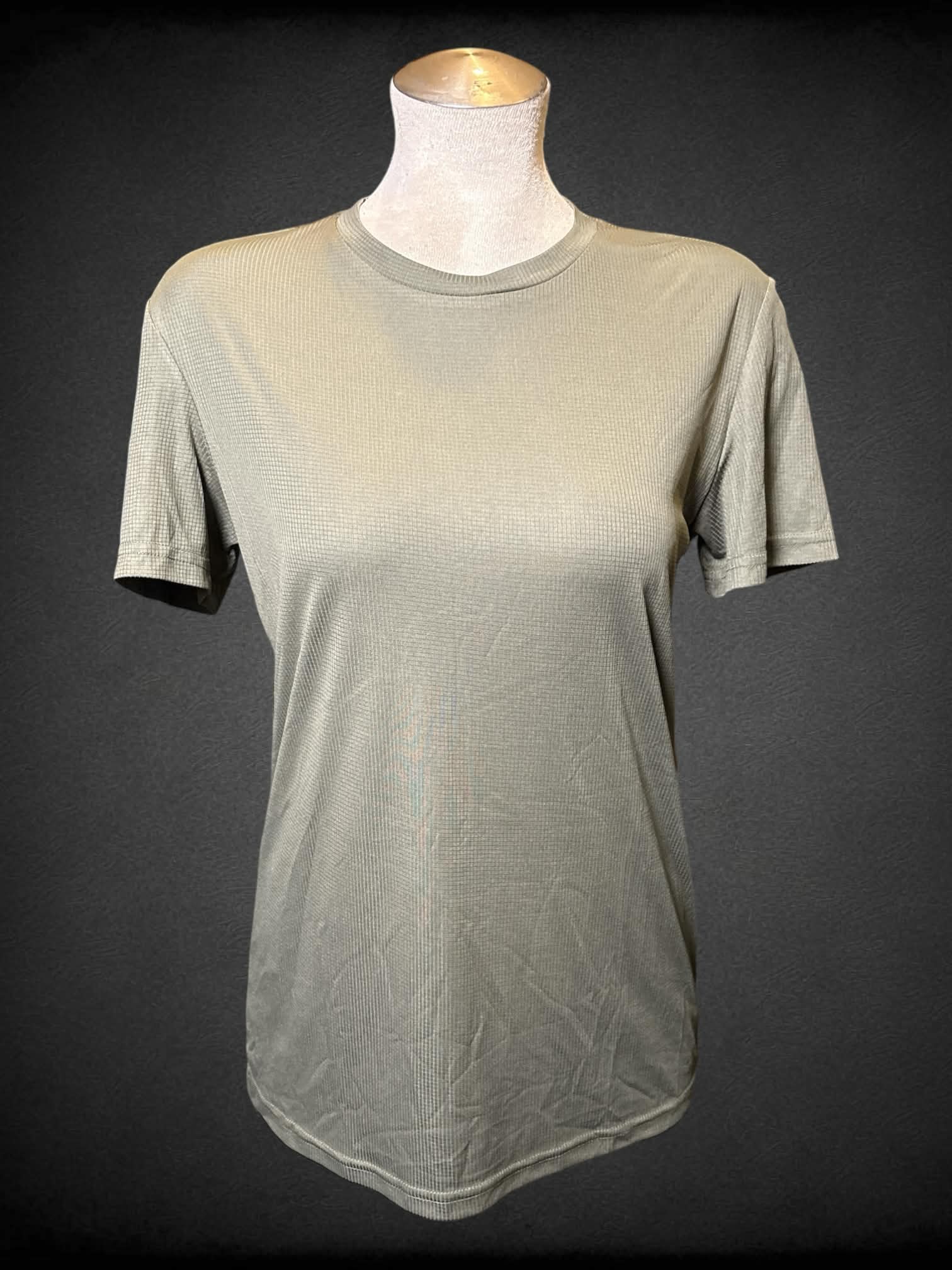 L Green athletic material t shirt