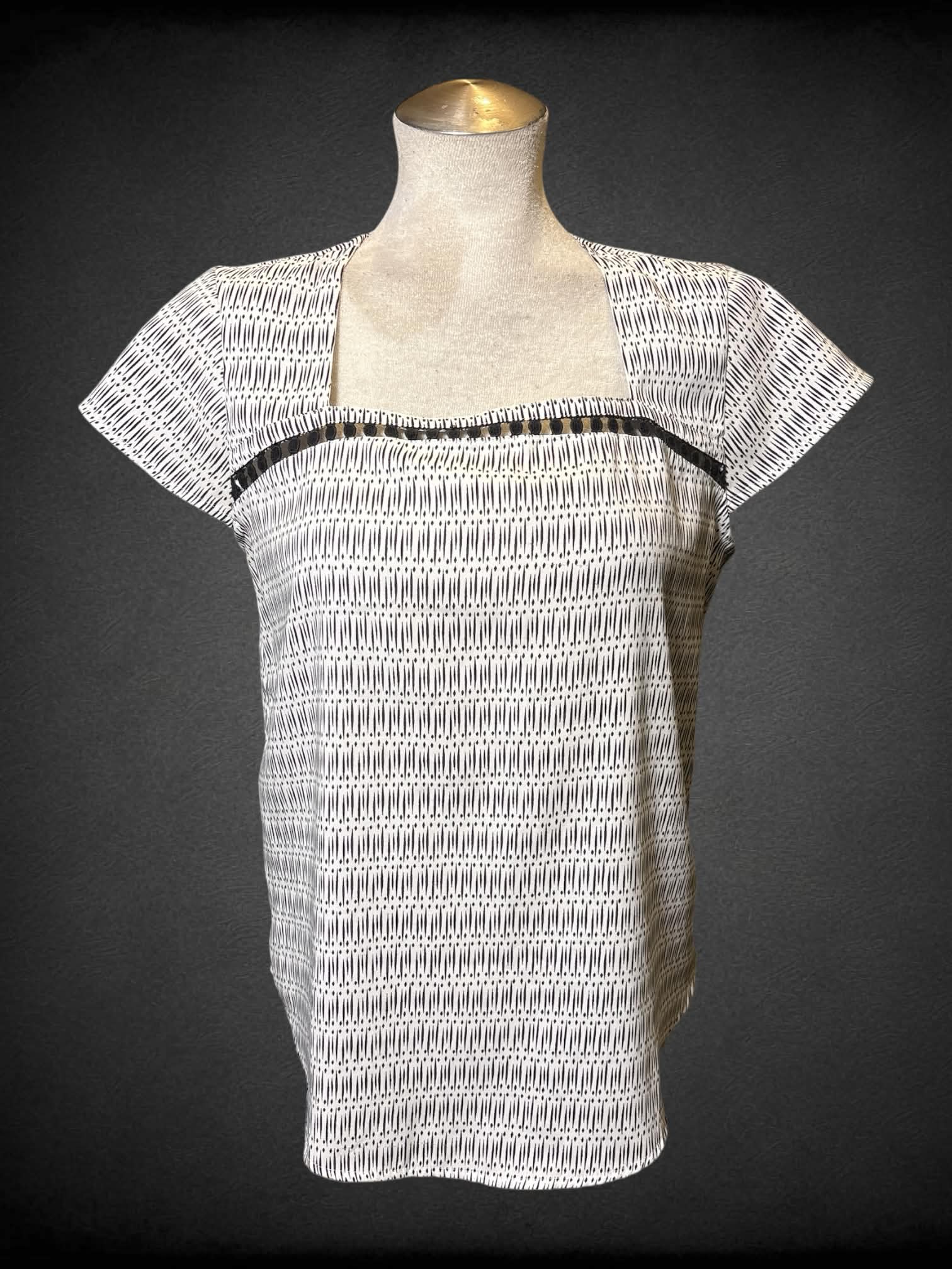 L Ann Taylor white and black short sleeve top with crochet cutout design on neckline