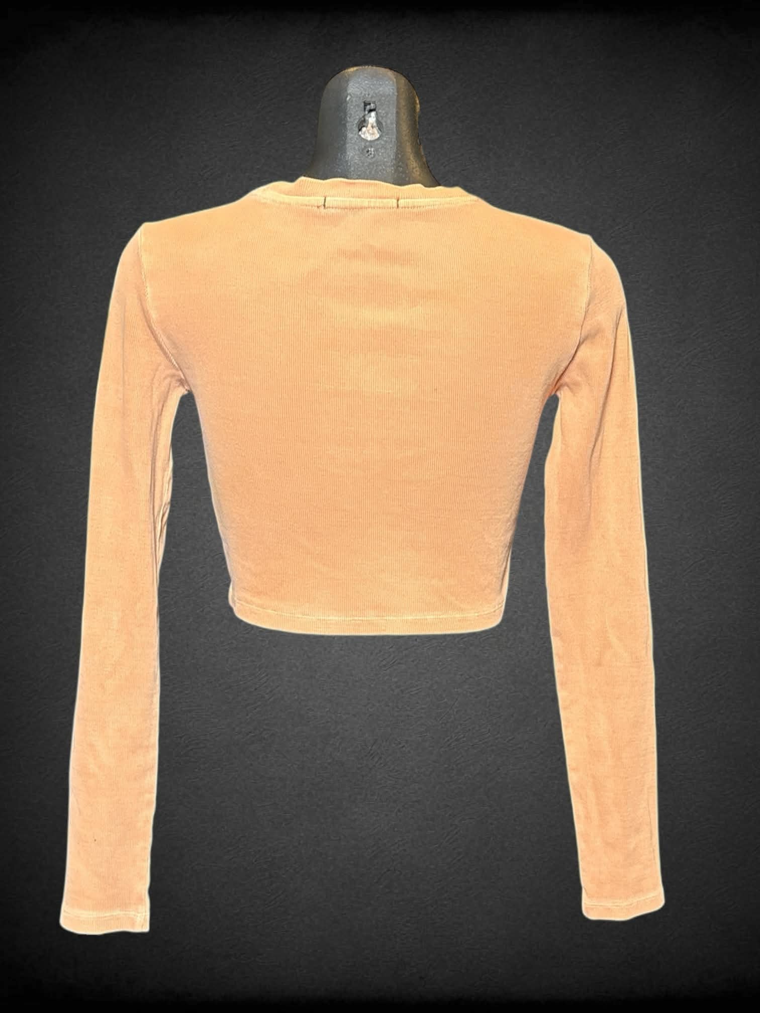 M Forever 21 orange long sleeve crop top with “Wild Child” graphic on front