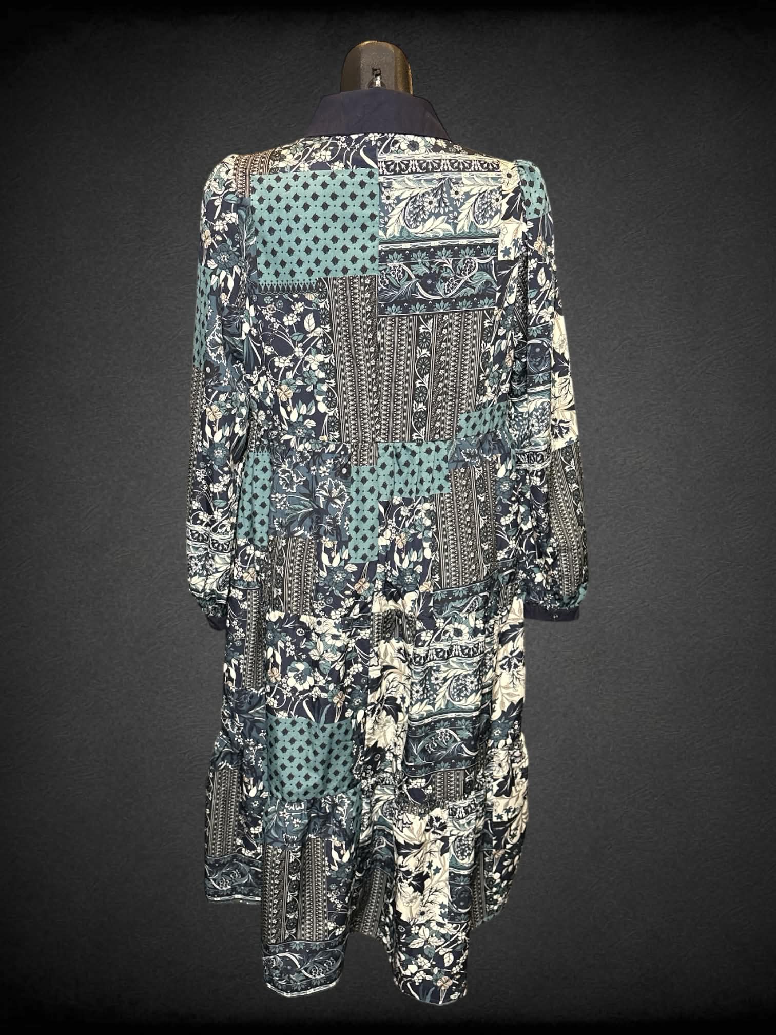 M Umgee navy blue long sleeve multi pattern dress with half buttons on front, collar, & pocket