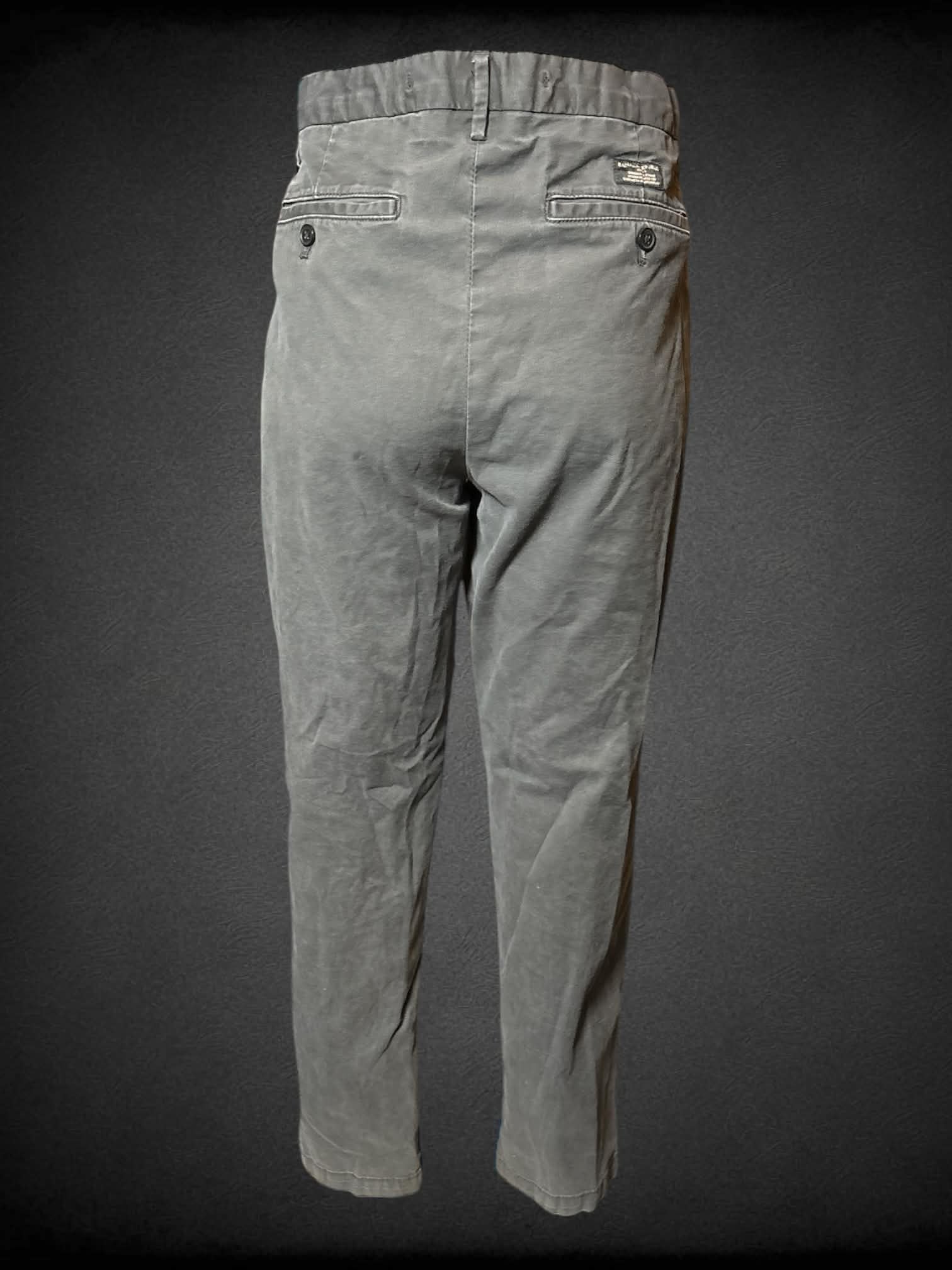 L Banana Republic grey pants with double button/zipper closure on front, and pockets