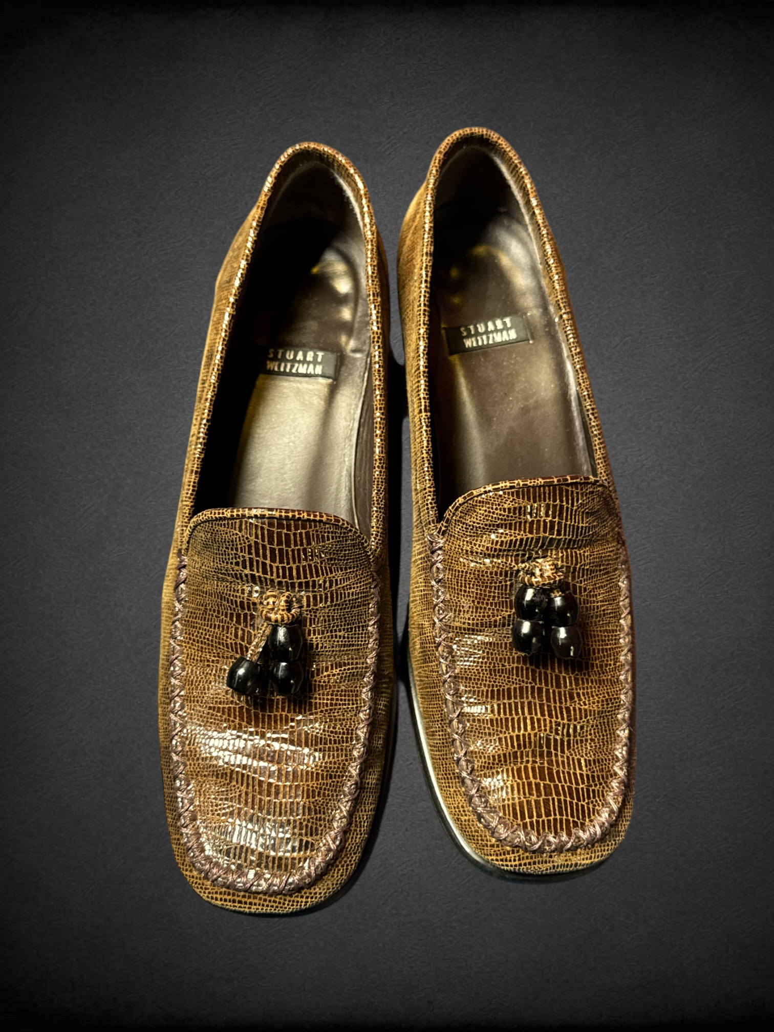 Size 6 Stuart Weitzman brown loafers with croc-embossed leather pattern and beaded tassel embellishments
