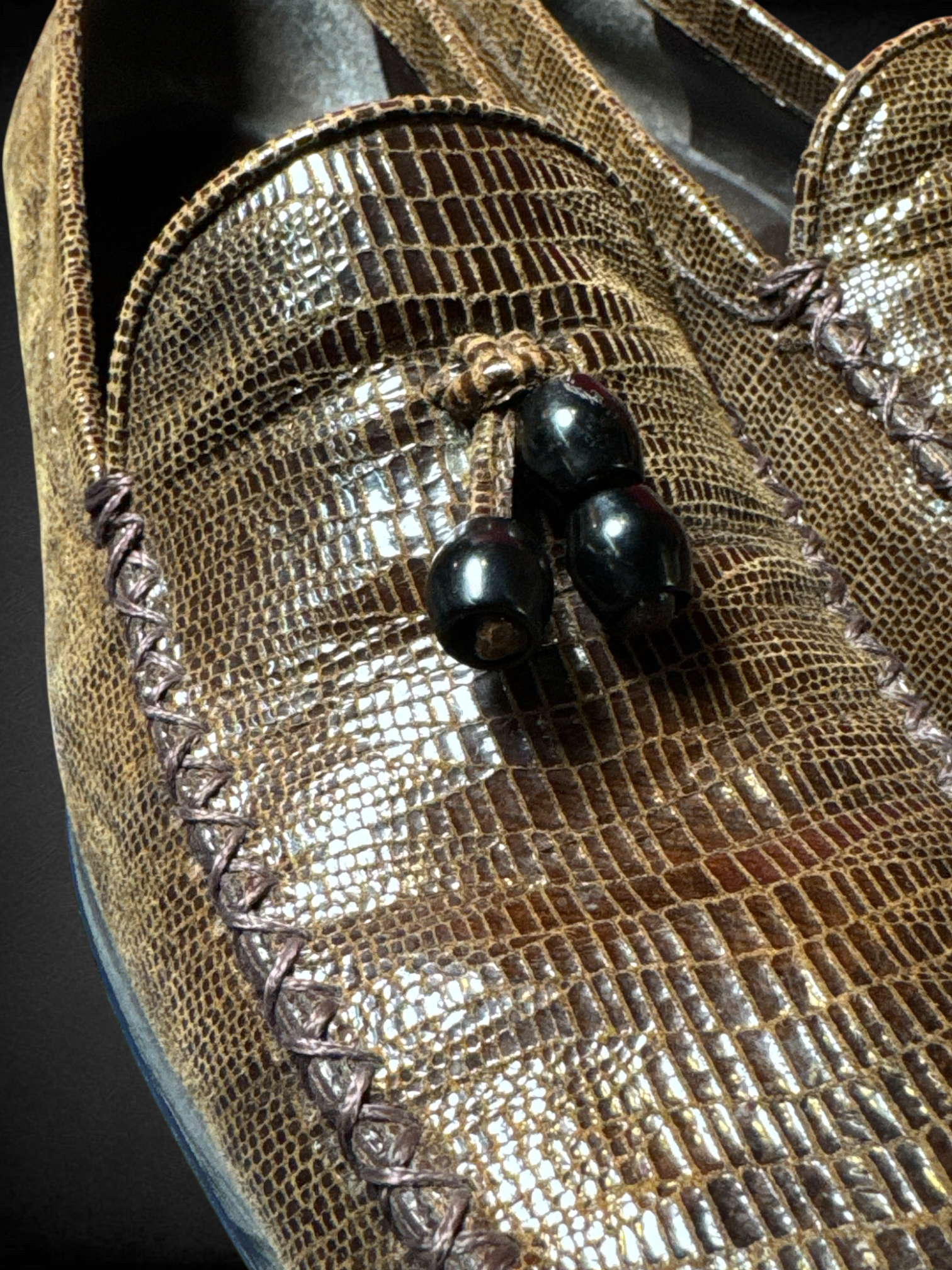 Size 6 Stuart Weitzman brown loafers with croc-embossed leather pattern and beaded tassel embellishments
