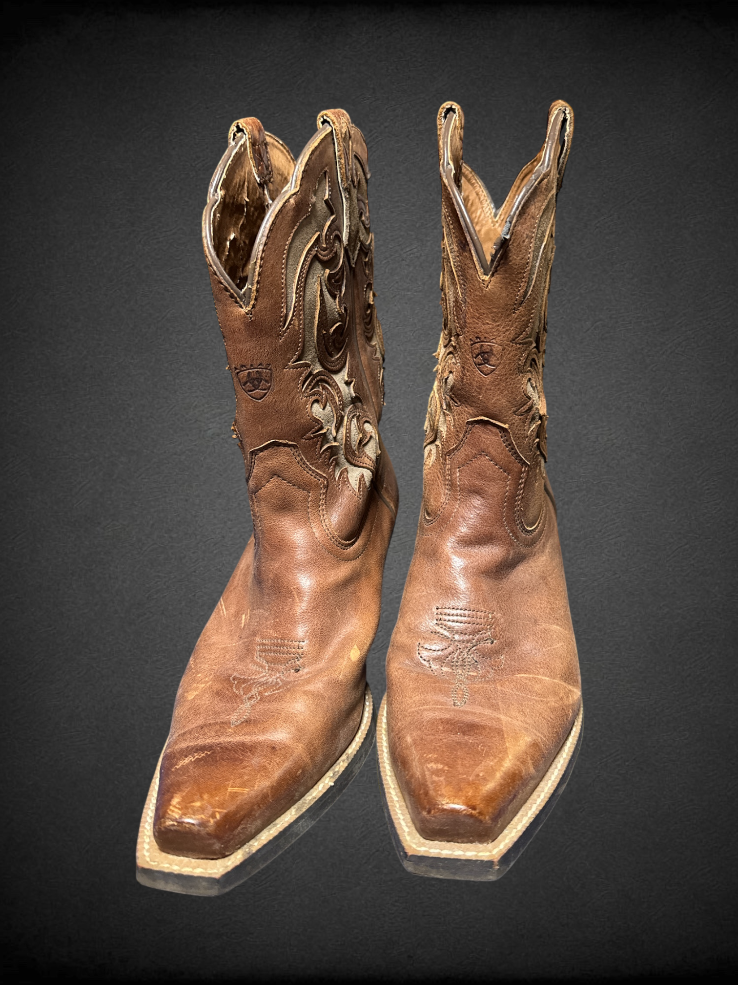 Size 8.5 Ariat Women's Round Up Bliss Western Boots with full-grain leather and intricate cutouts