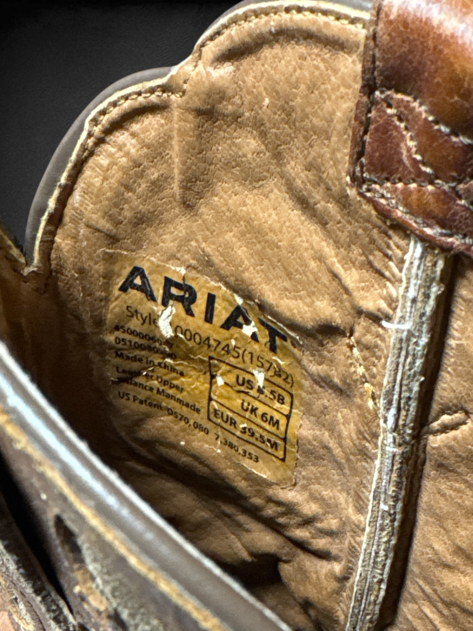 Size 8.5 Ariat Women's Round Up Bliss Western Boots with full-grain leather and intricate cutouts