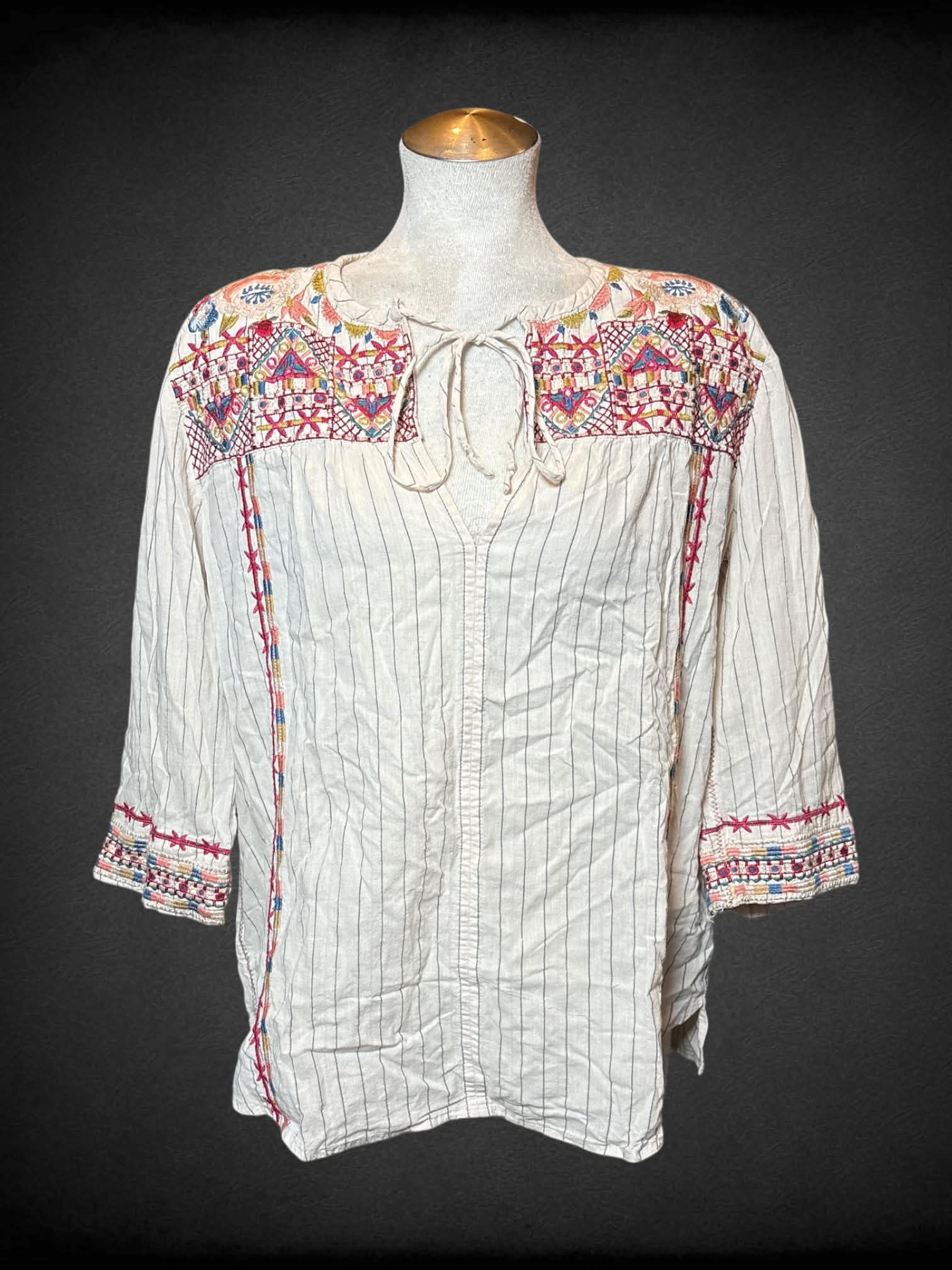 L Johnny Was Workshop white half sleeve top with multicolor embroidered designs, and tie on neck