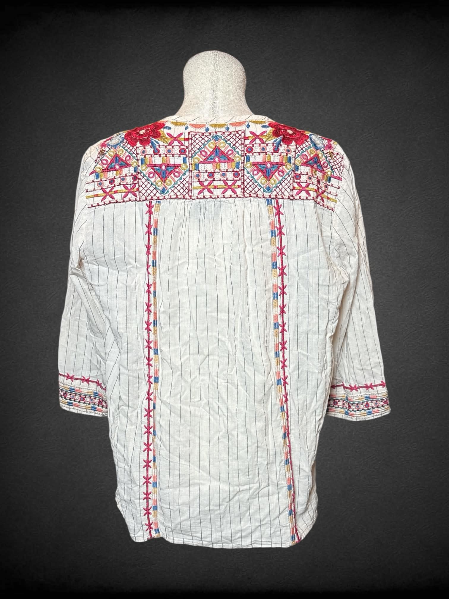 L Johnny Was Workshop white half sleeve top with multicolor embroidered designs, and tie on neck