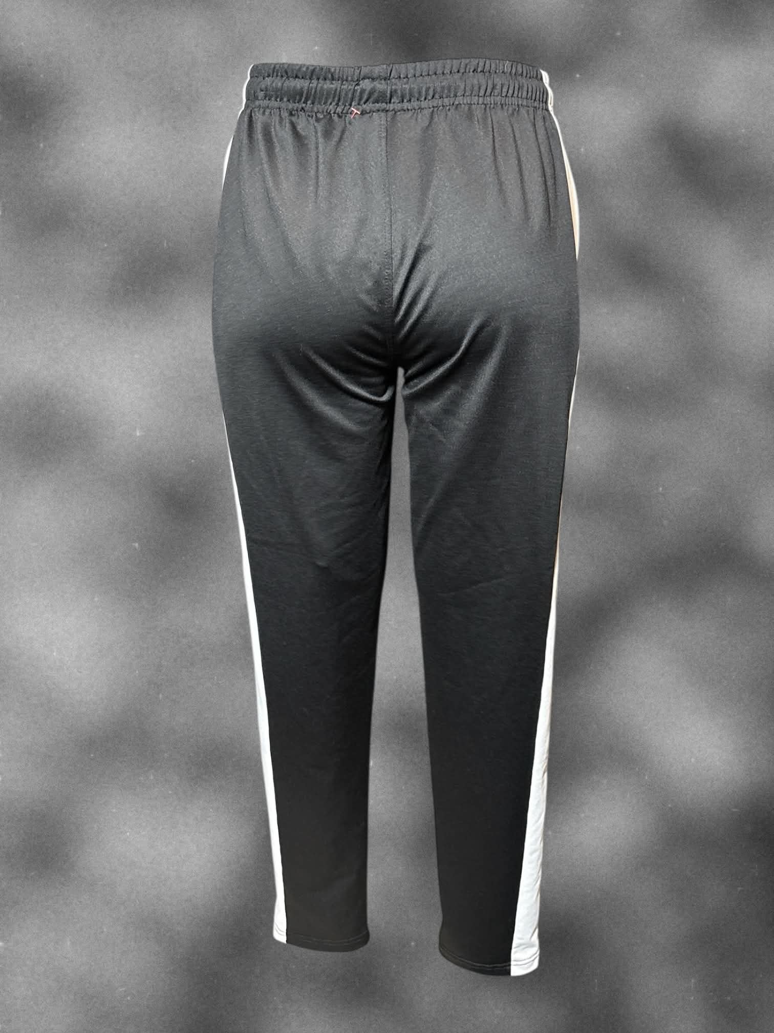 L Black pants with white stripes on sides, drawstring, and zipper pockets