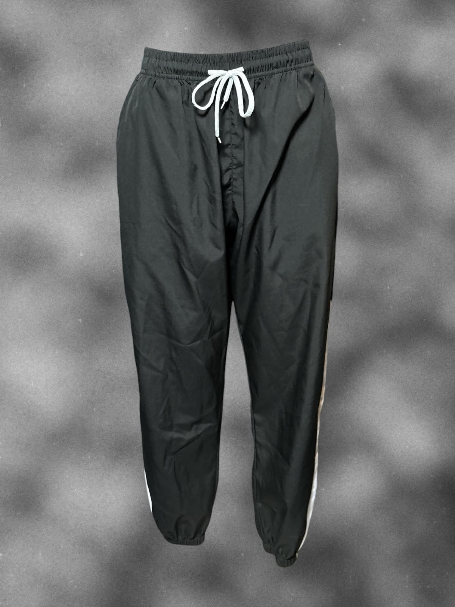 L Black pants with white panel on sides, pockets, and drawstring